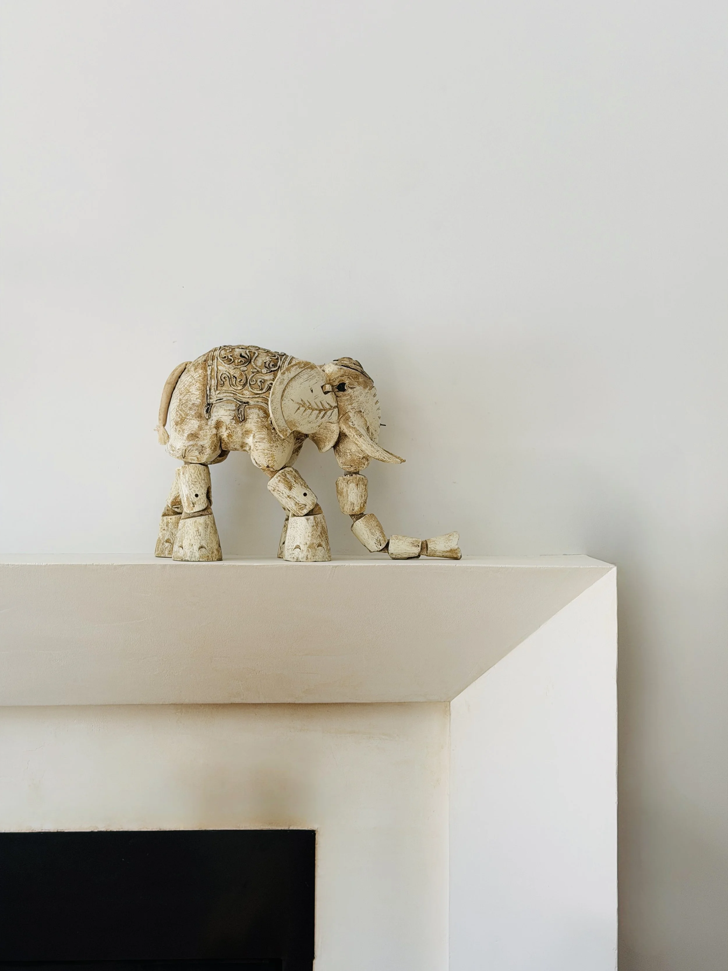 MATERI(A)NTIQUES LARGE IVORY CARVED WOOD MOBILE JOINT ELEPHANT FIGURINE.jpg