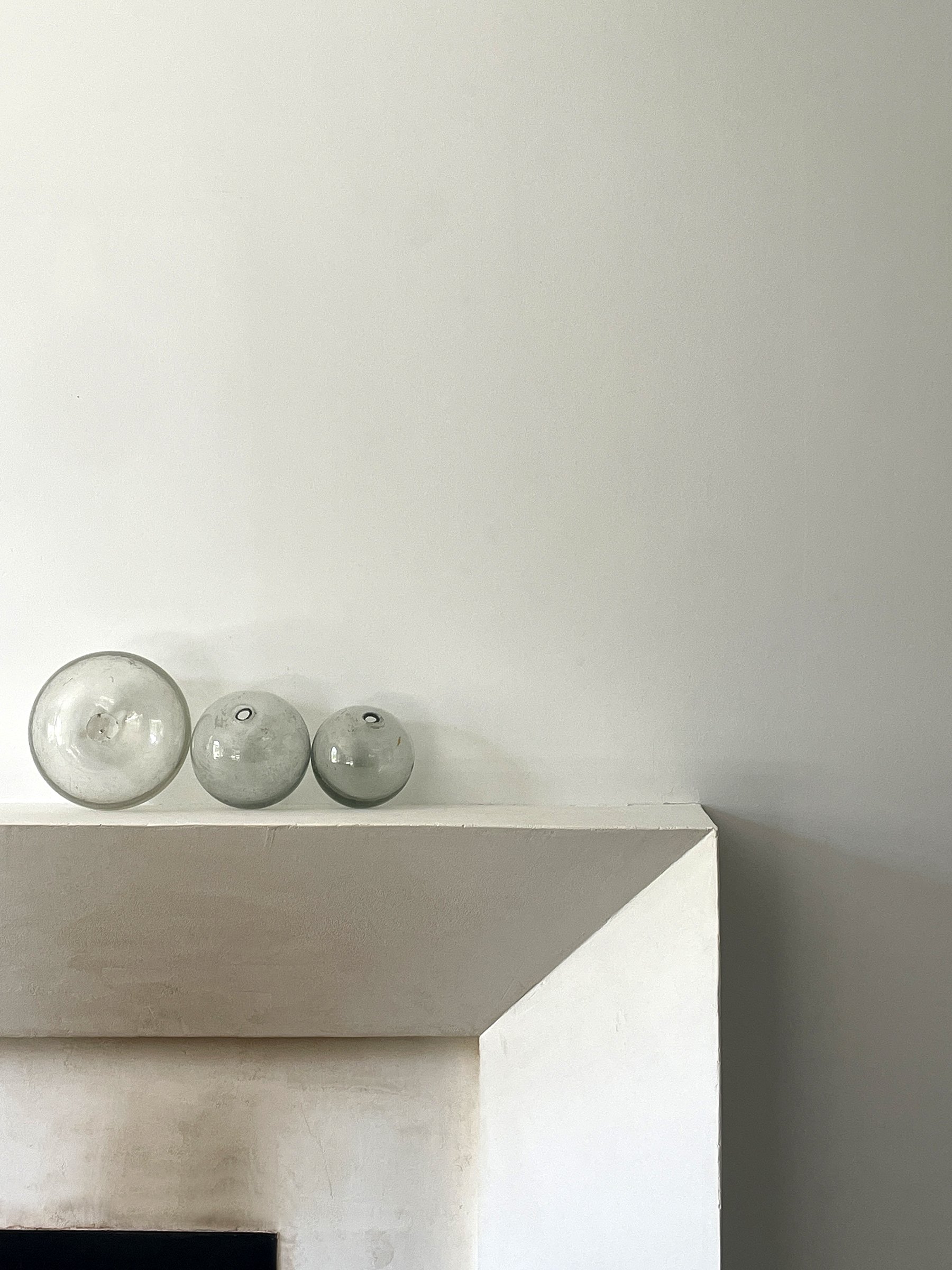 MATERI(A)NTIQUES SET OF THREE CLEAR GLASS SEIN FLOATS.jpg