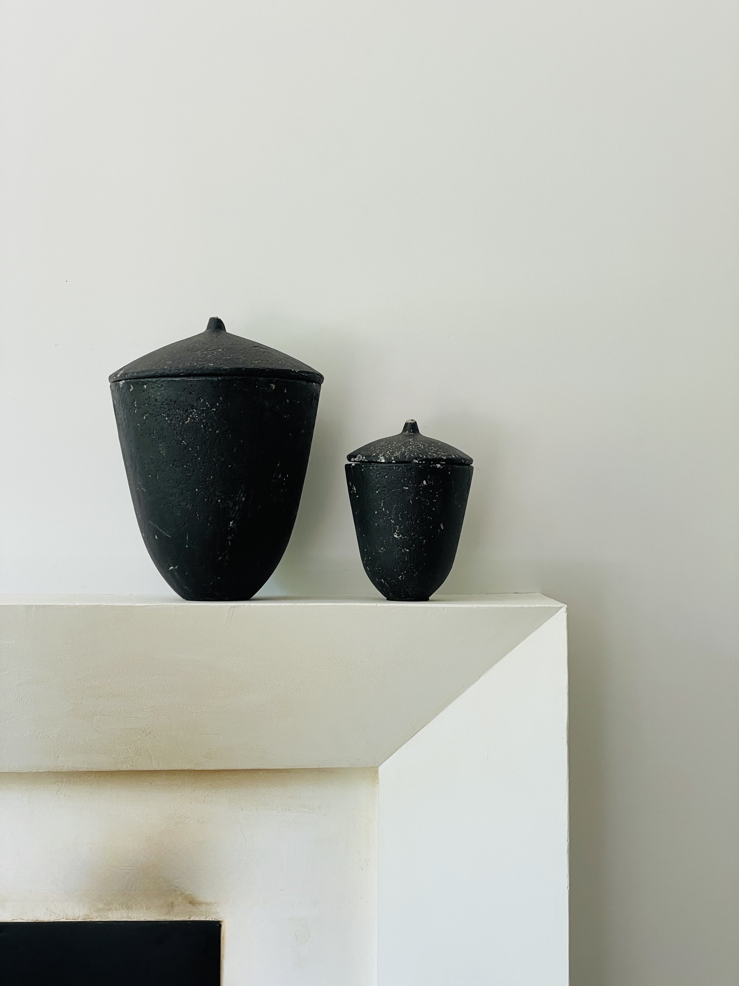 MATERI(A)NTIQUES SET OF 2 ACORN SHAPED BLACK COMPOSITE VESSELS(4).jpg