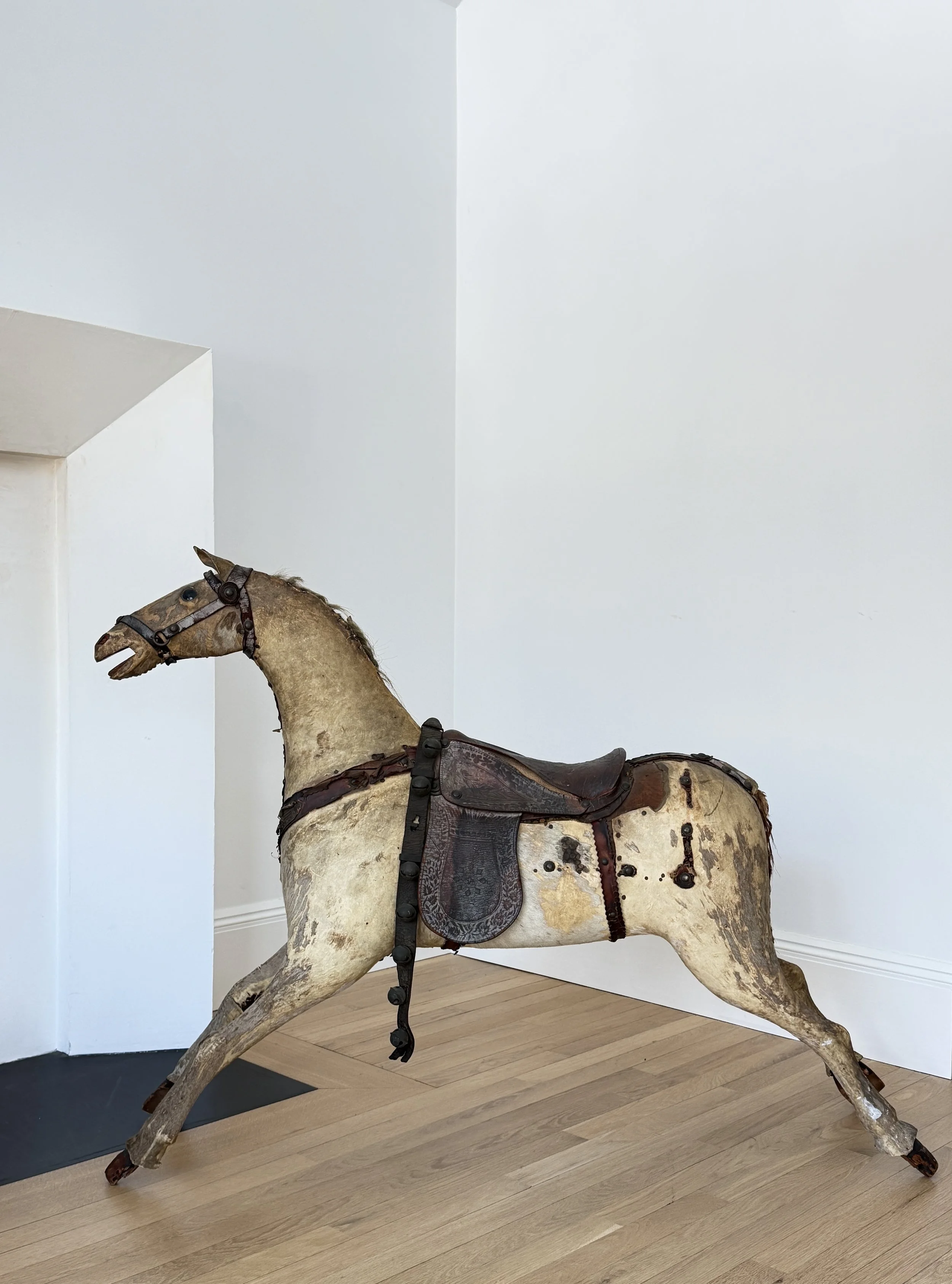 MATERI(A)NTIQUES EXTRA LARGE STITCHED LEATHER, HAIR AND WOOD TOY HORSE.2.jpg