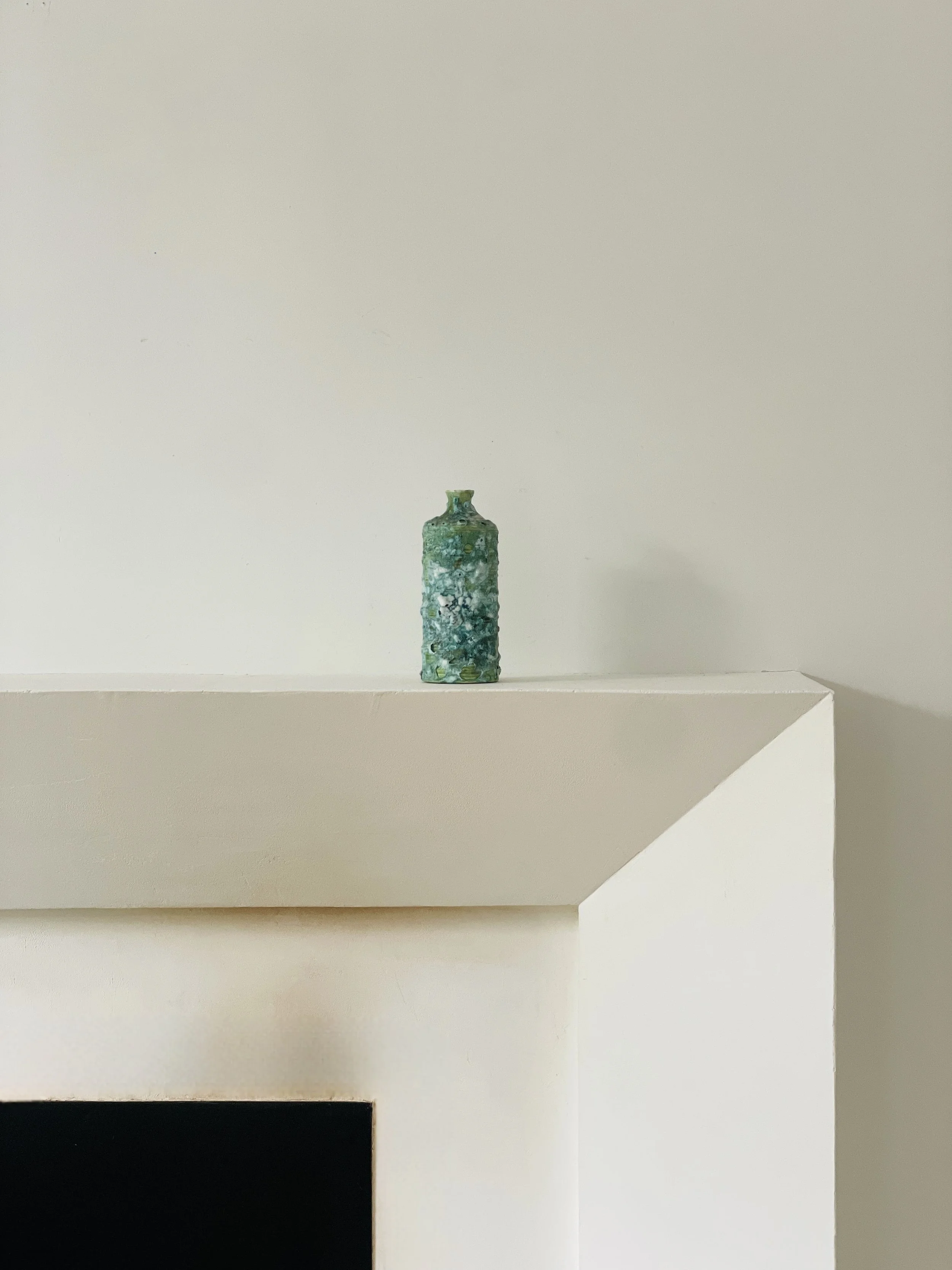 MATERI(A)NTIQUES SMALL GREEN STUDIO POTTERY BUD VASE WITH BUMPY GLAZE.jpg