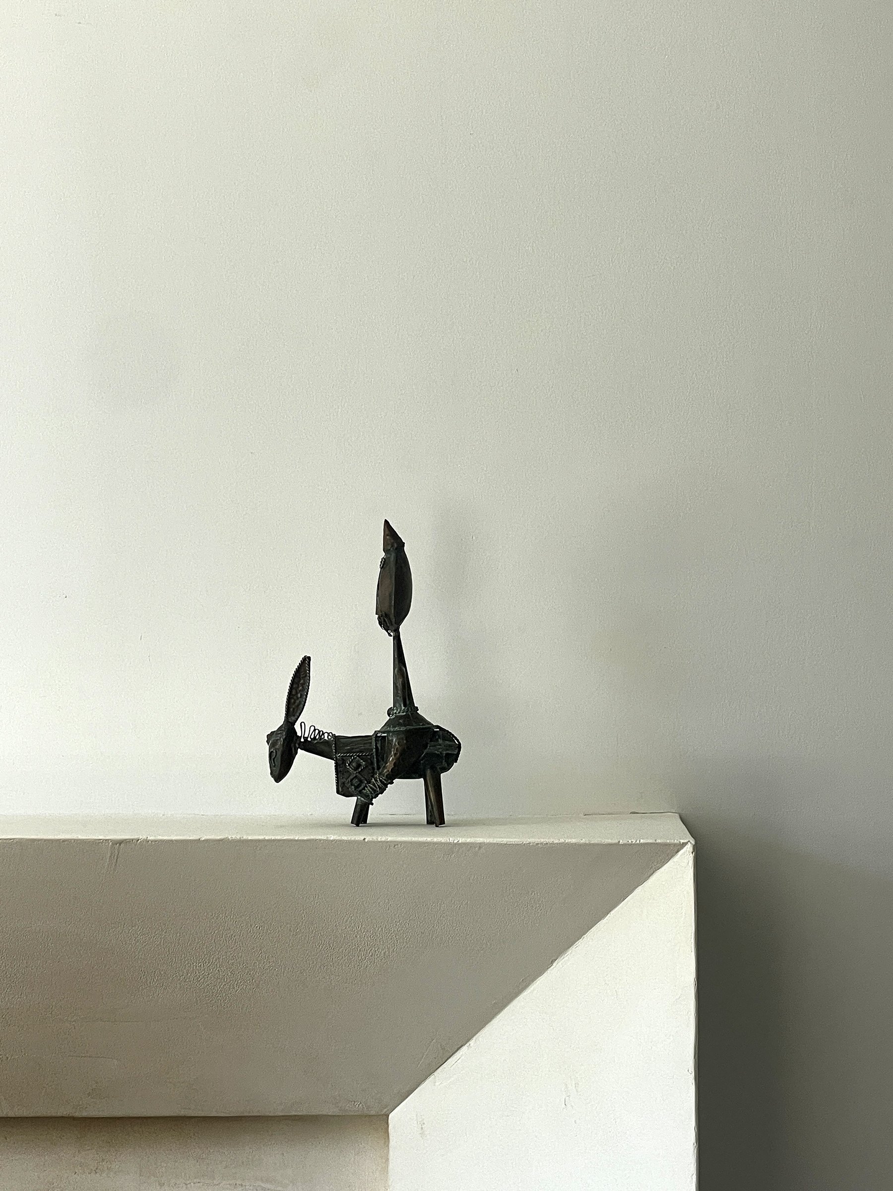 MATERI(A)NTIQUES SMALL RUSTIC METAL MAN RIDING DONKEY.jpg