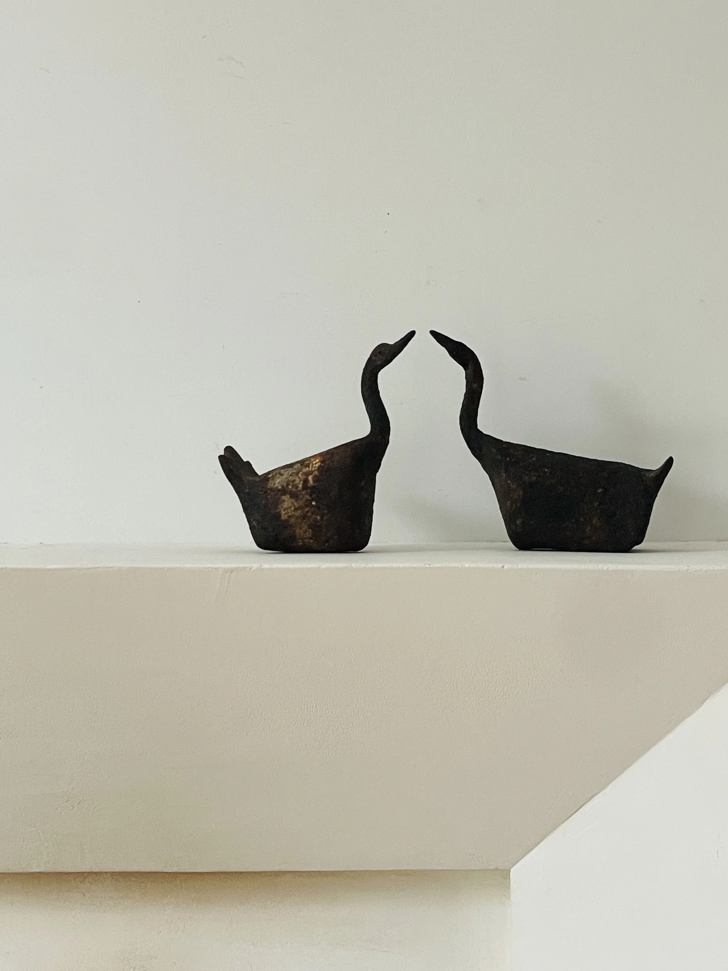 MATERI(A)NTIQUES METAL SWAN SET WITH RUST PATINA(2).jpg