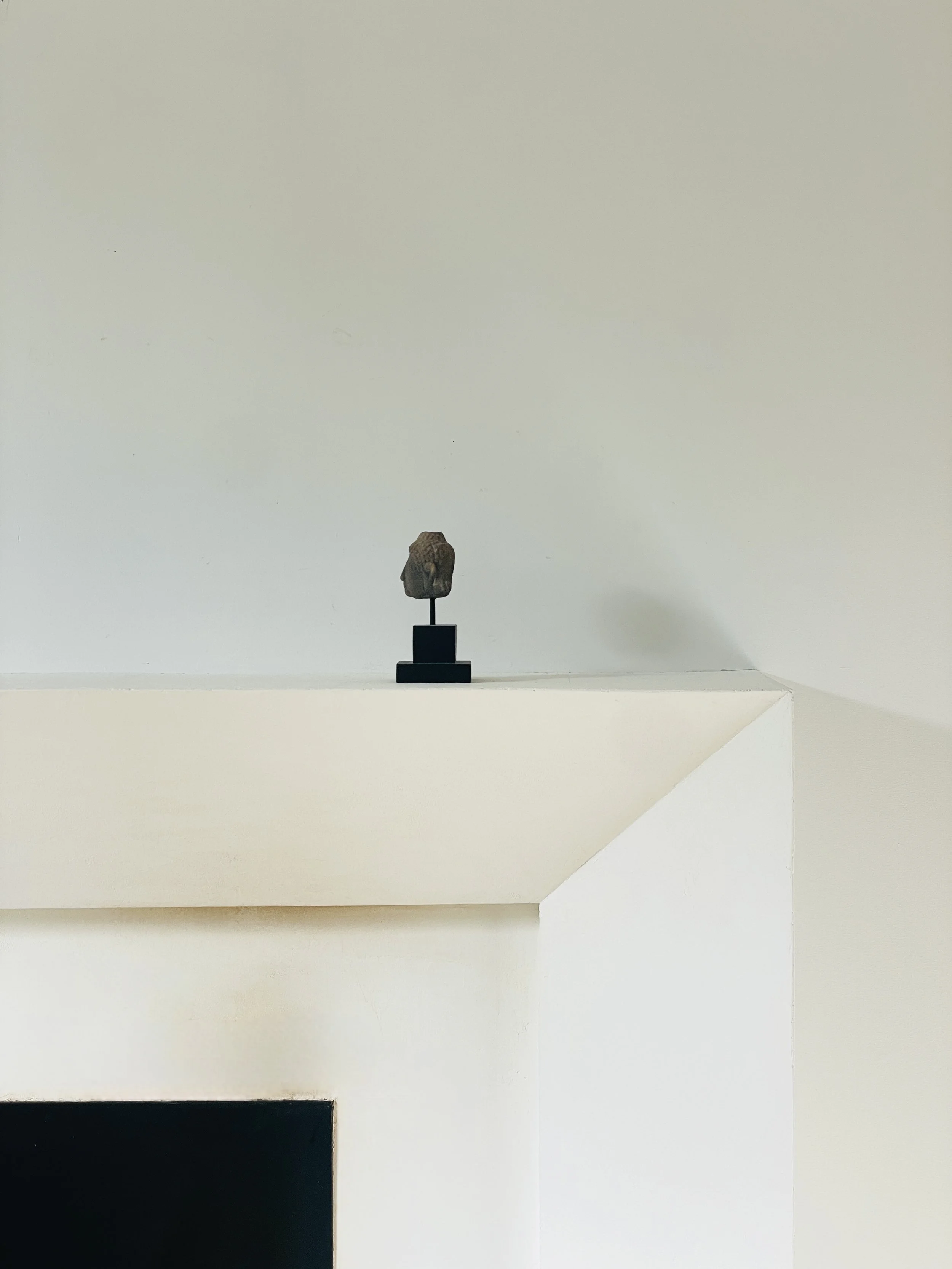 MATERI(A)NTIQUES SMALL CERAMIC BUDDHA HEAD ON BLACK STAND(3).jpg