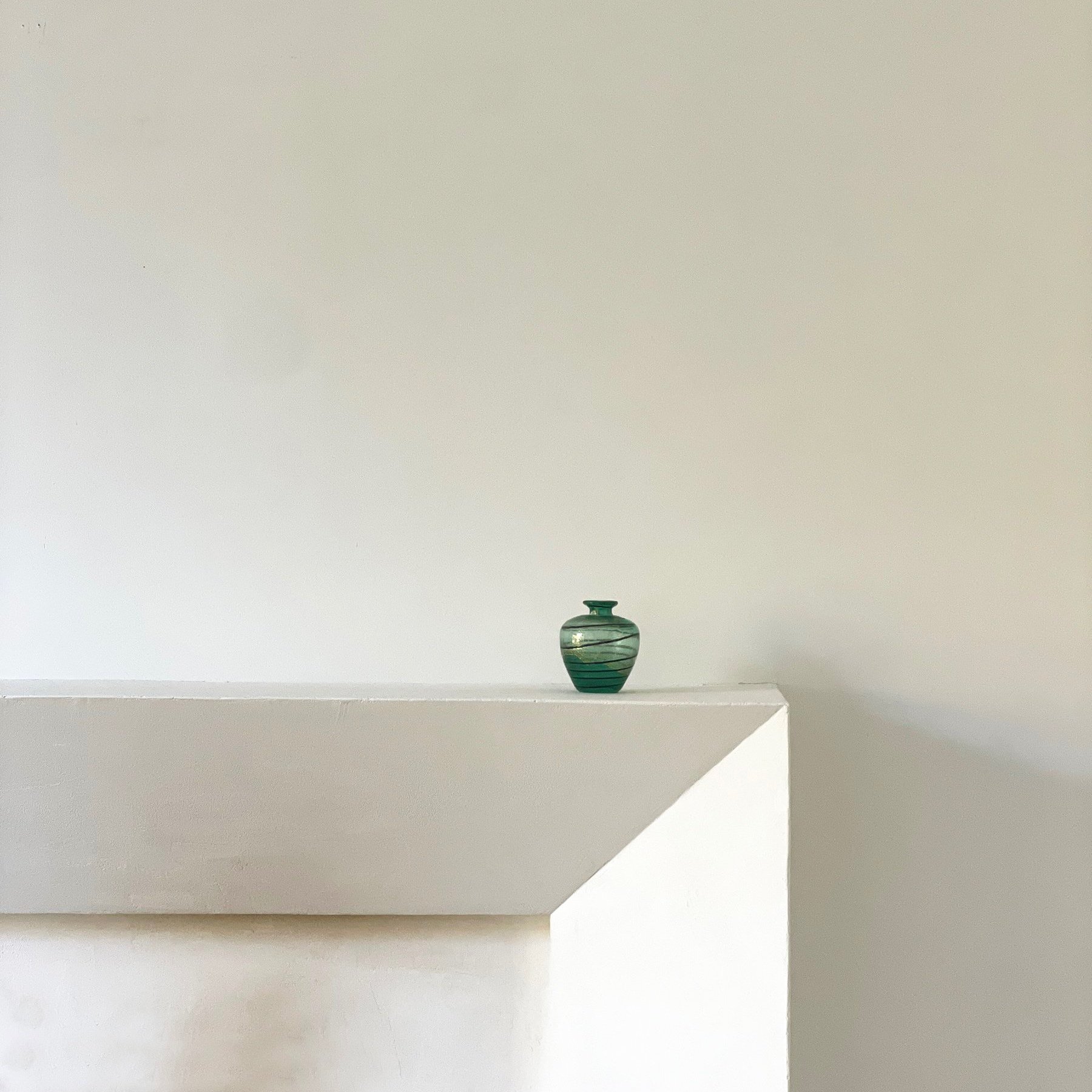 MATERIA-ANTIQUES-GREEN-GLASS-SPIRAL-BUD-VASE-RELEASE-3.jpg