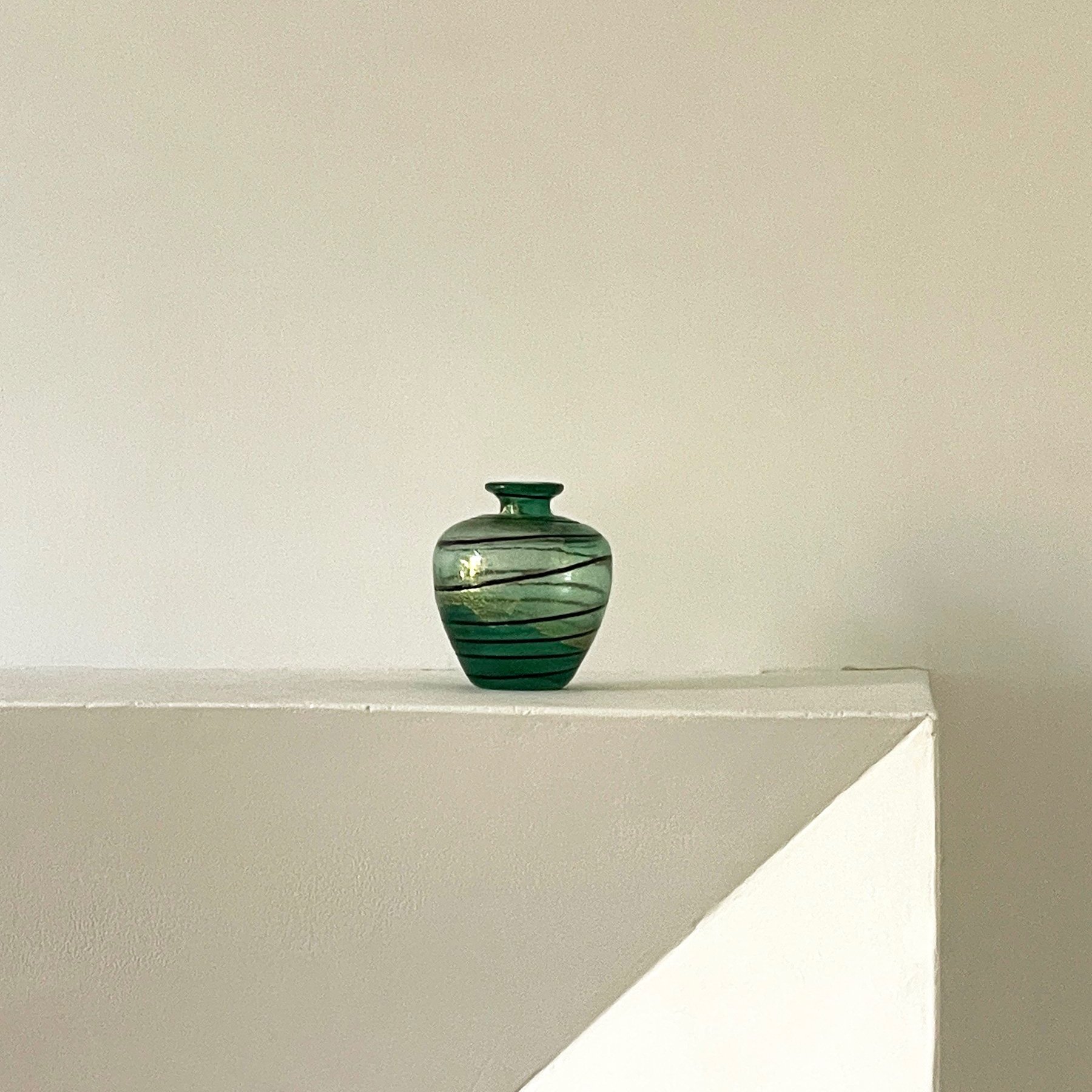 MATERIA-ANTIQUES-GREEN-GLASS-SPIRAL-BUD-VASE-RELEASE-3%282%29.jpg