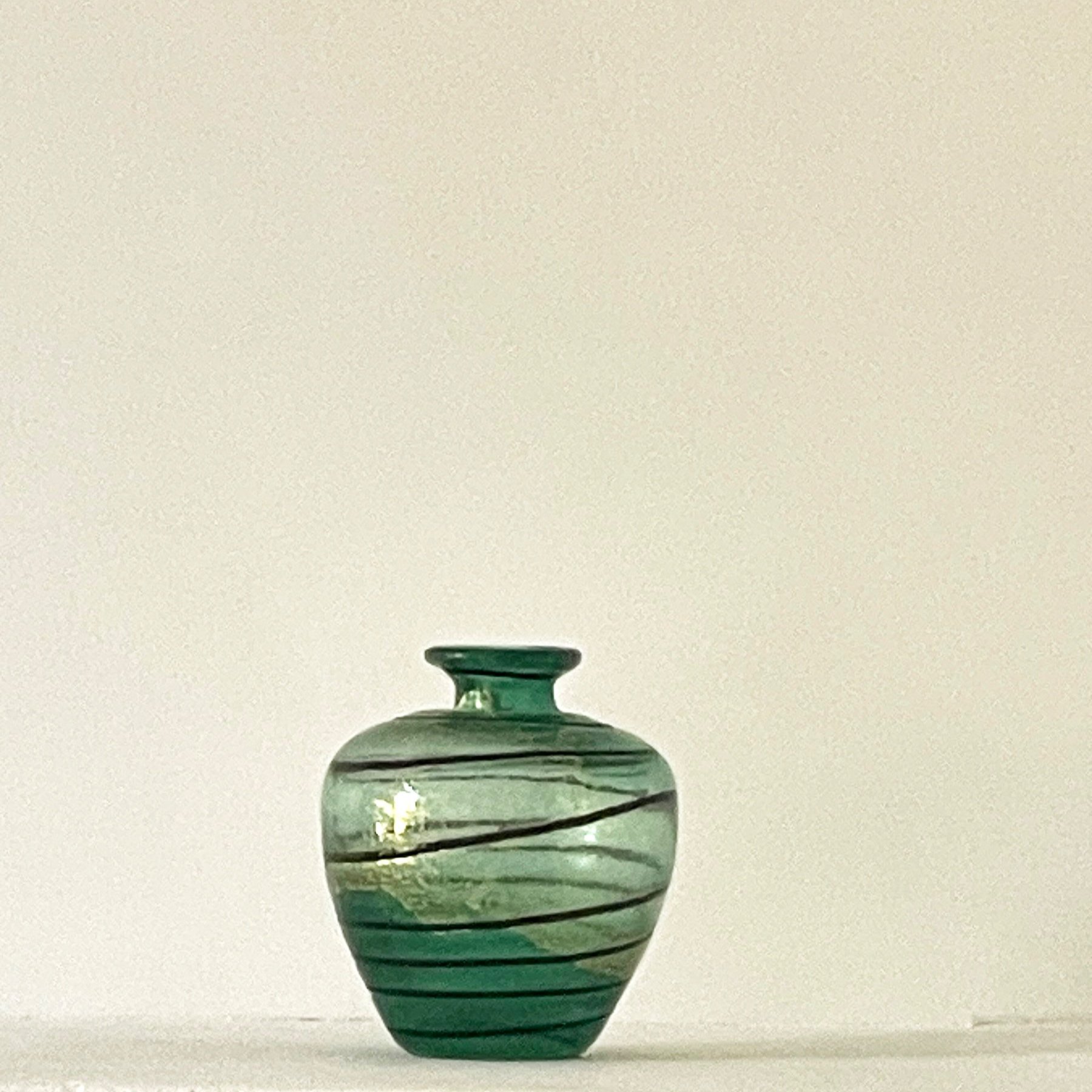 MATERIA-ANTIQUES-GREEN-GLASS-SPIRAL-BUD-VASE-RELEASE-3%283%29.jpg