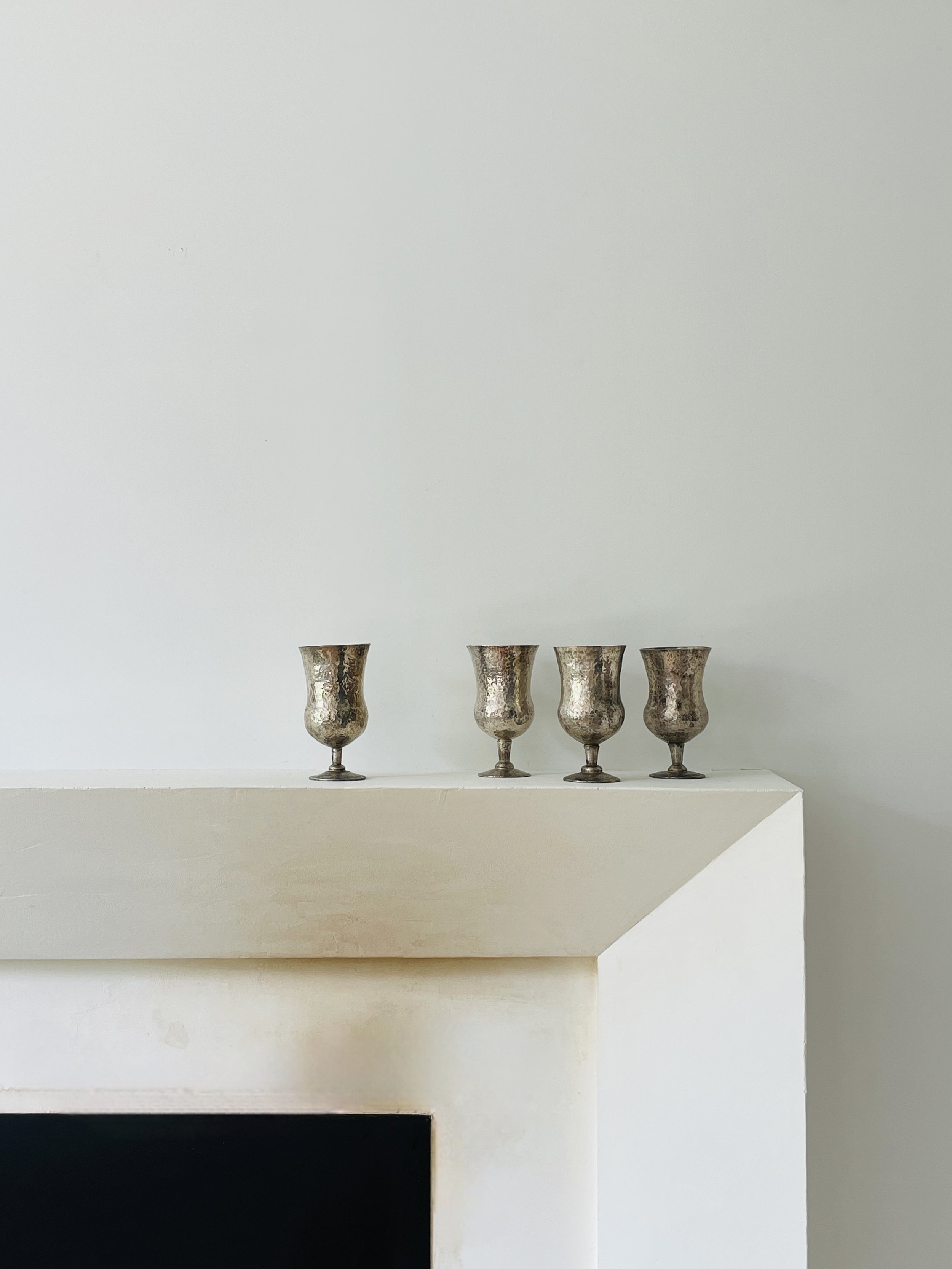 MATERI(A)NTIQUES SET OF 4 HAMMERED SILVER GOBLETS.jpg
