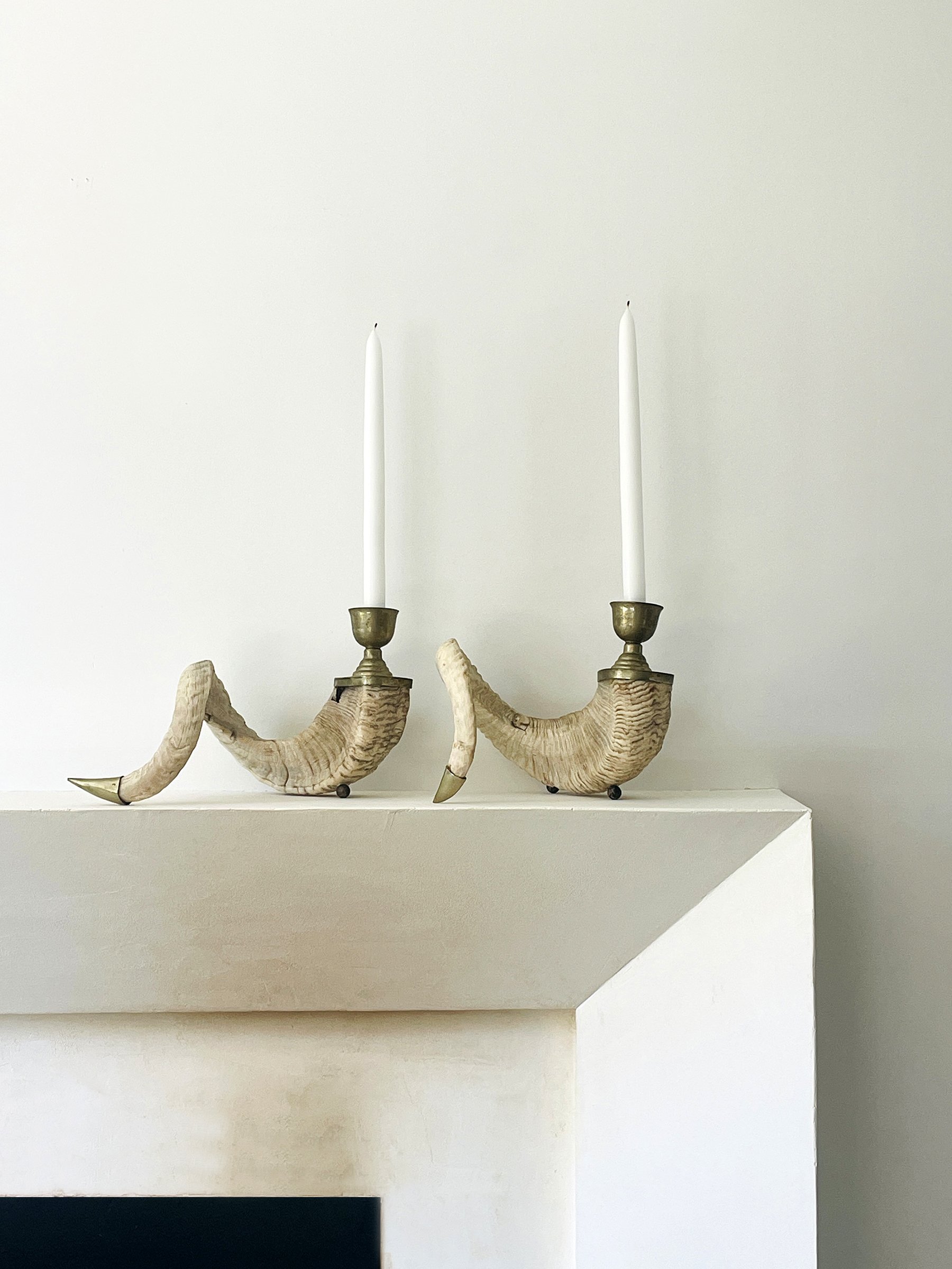 MATERI(A)NTIQUES SET OF HORN AND SILVER CANDLESTICKS.jpg
