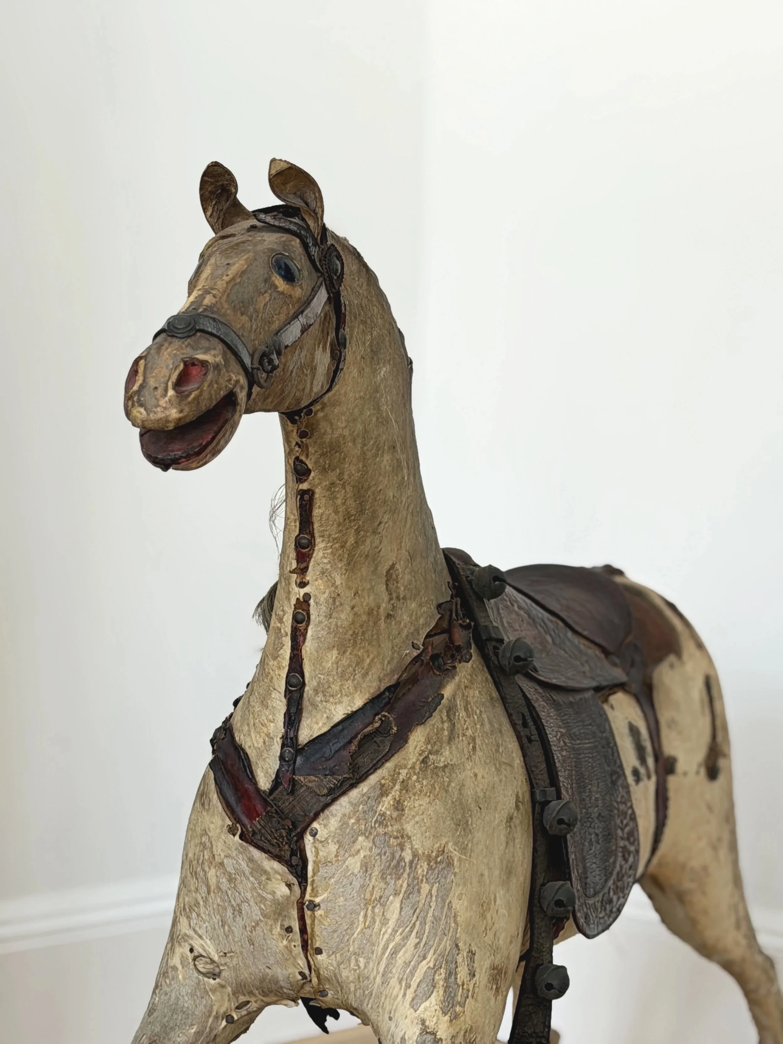 MATERI(A)NTIQUES EXTRA LARGE STITCHED LEATHER, HAIR AND WOOD TOY HORSE