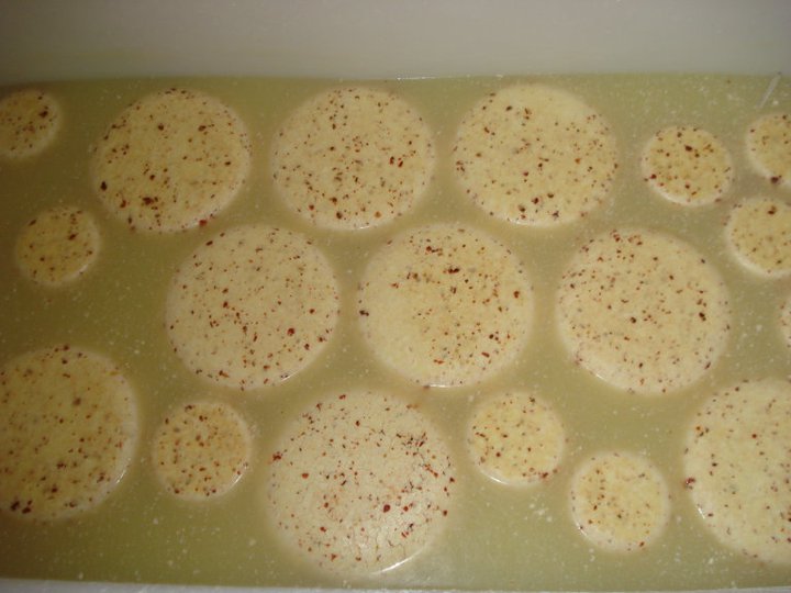  After pressing, cheese wheels go into the brine. 