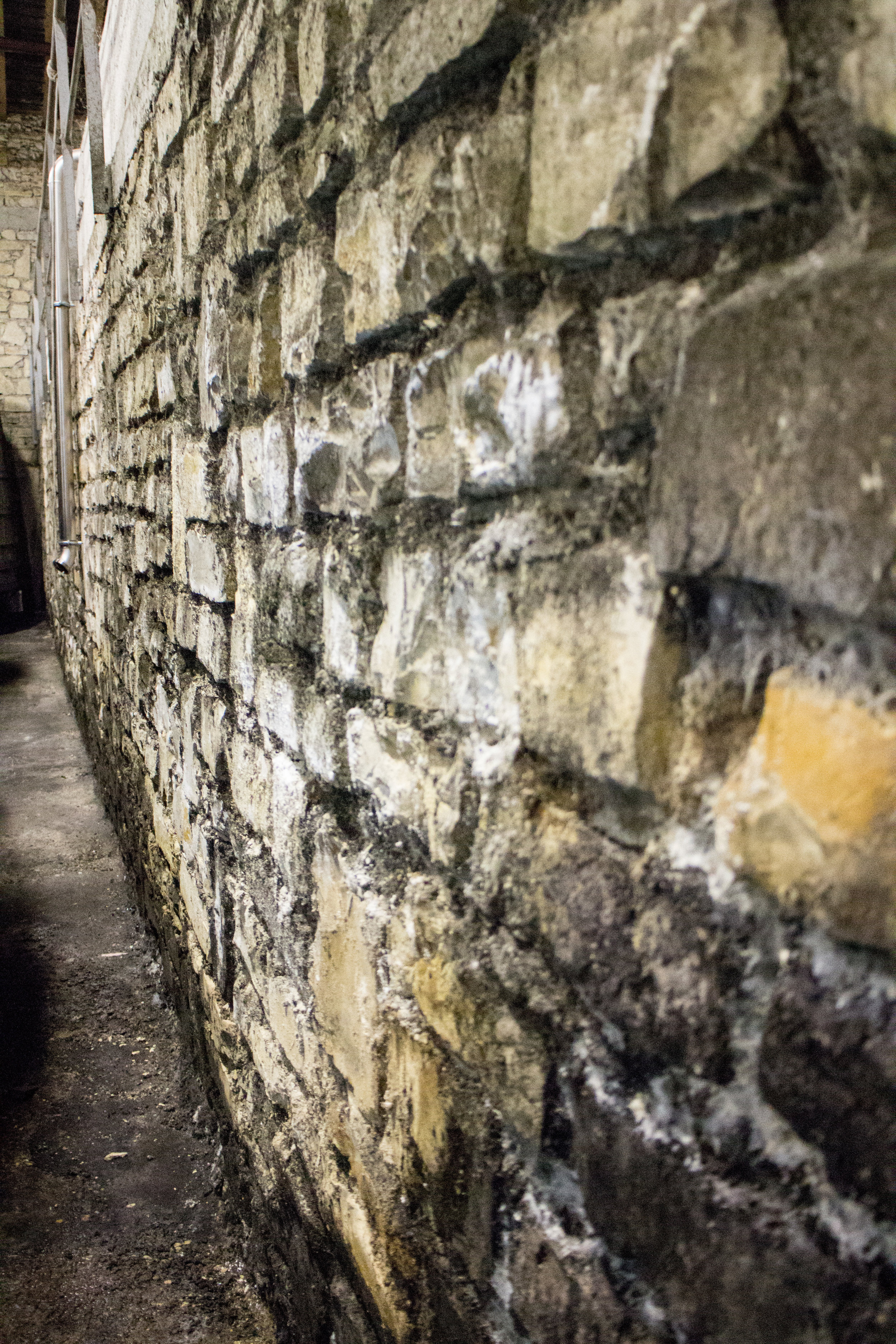 Thick stone walls keep the aging areas cool.