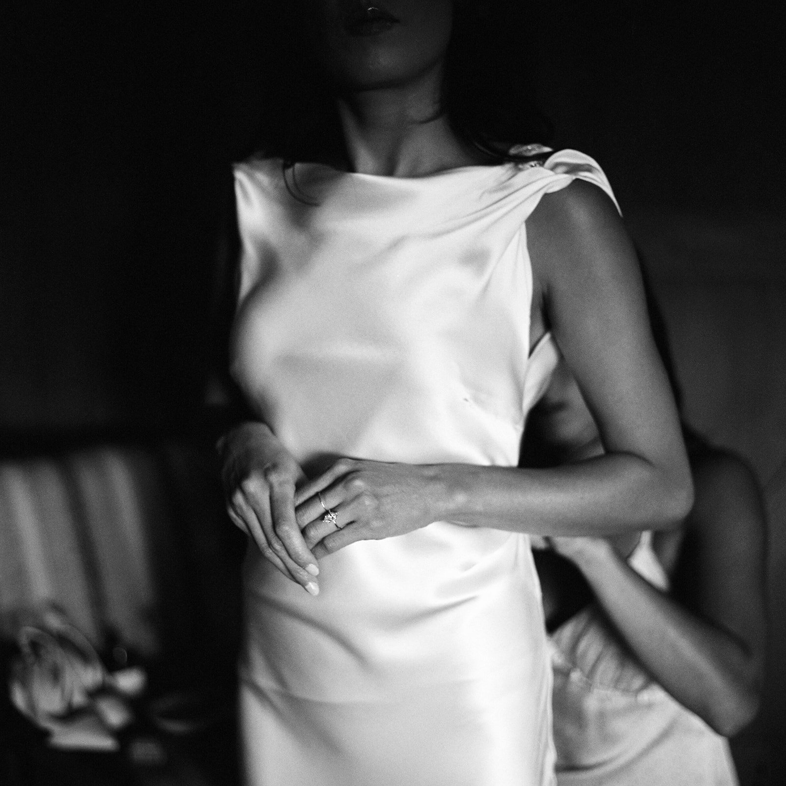 ilm photograph on medium format of grand teton national park wedding bride getting ready in black and white film