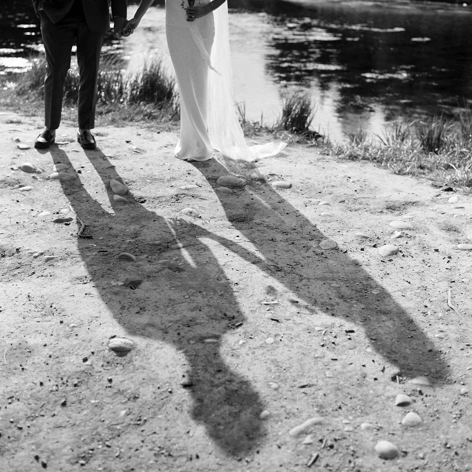 black and white film photograph of couple at wedding in grand tetons national park