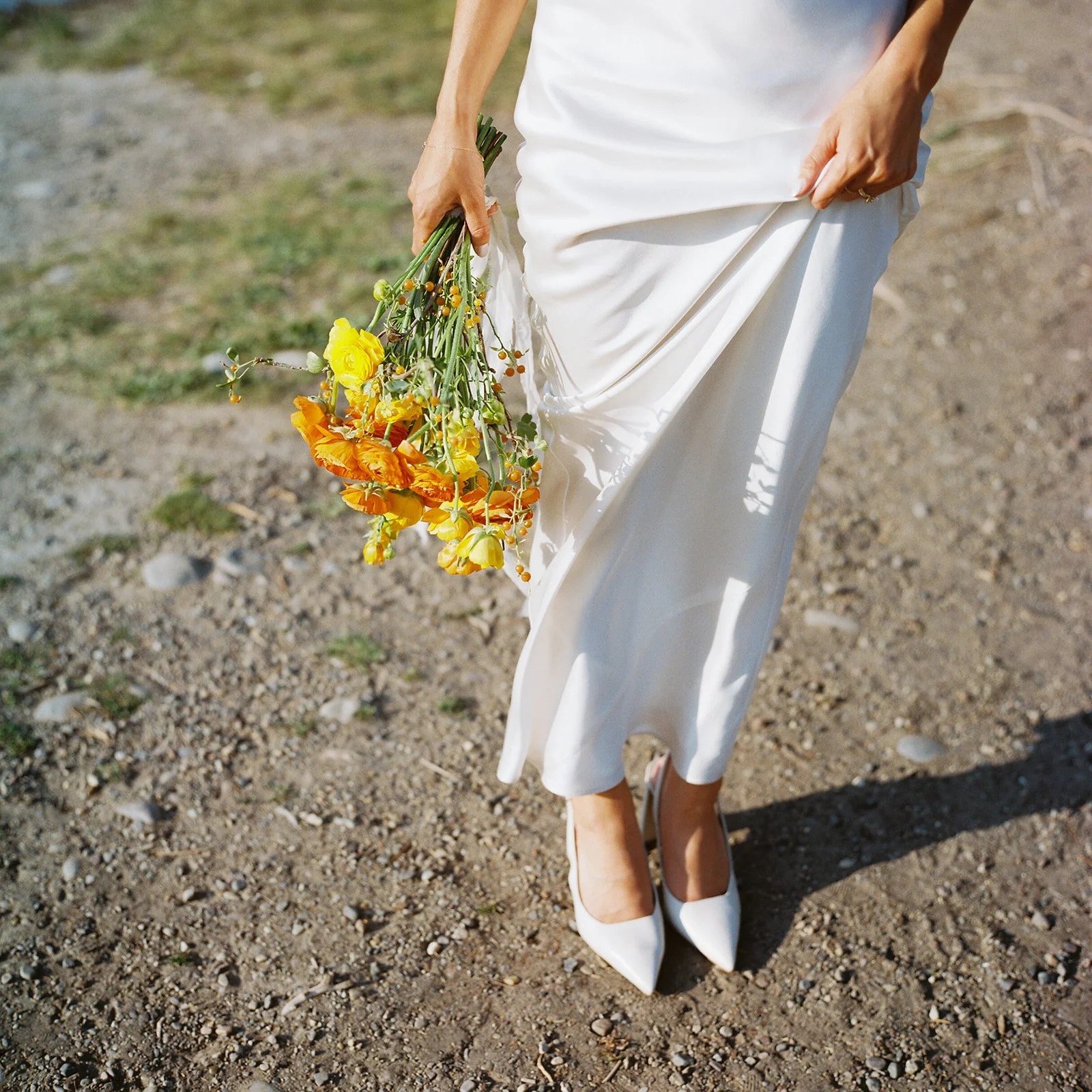 ilm photograph on medium format of a bride holding wildflower bouquet grand teton national park wedding