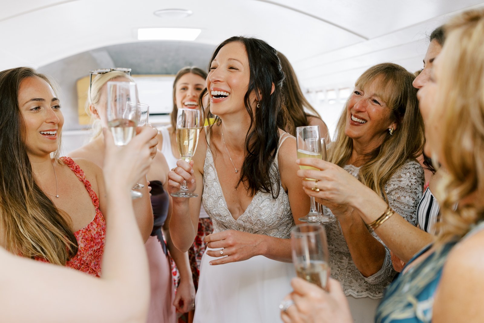 Bride and bridesmaids get ready in an Airstream at Ofland Escalante for the wedding in Escalante Utah