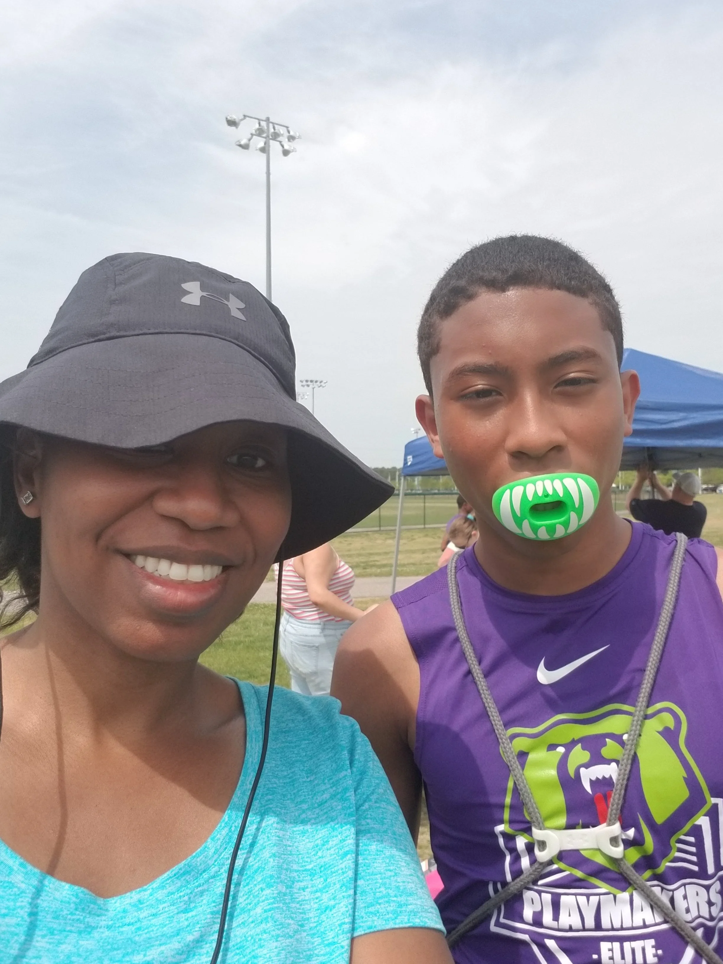 Me + my oldest son Juel, during last season’s 7v7 Football season