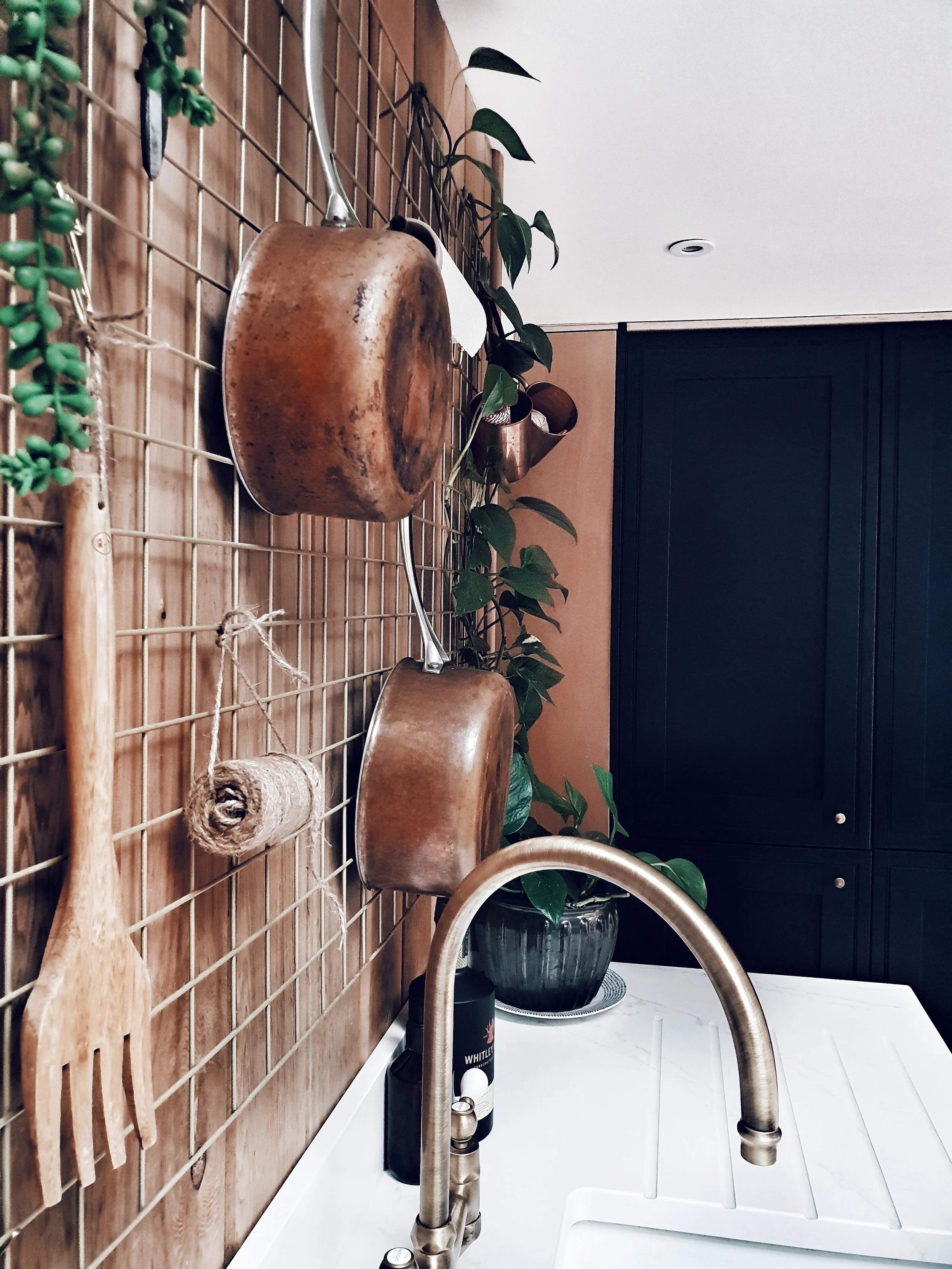 A close up of the brass kitchen tap of my dreams