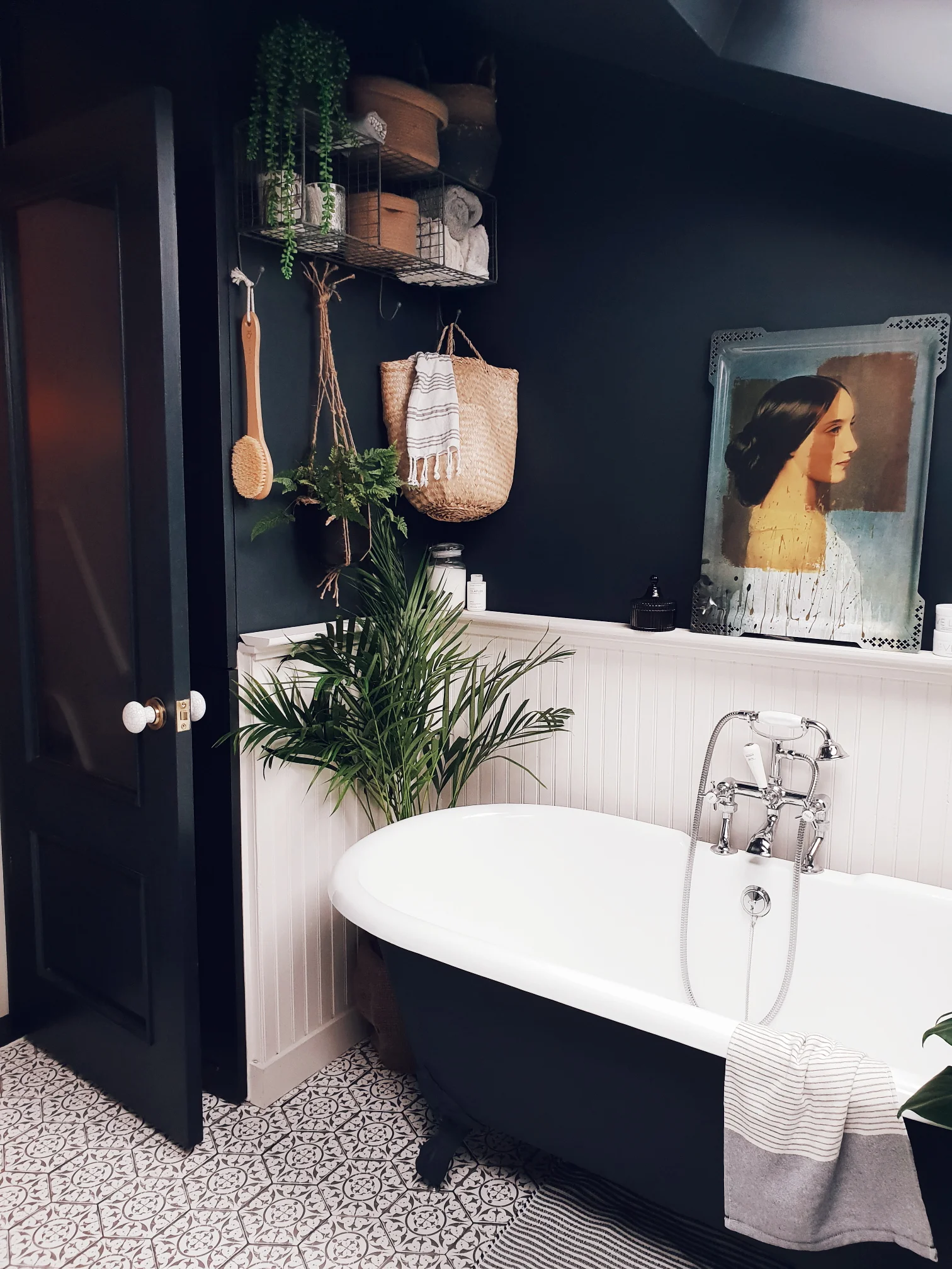 I loved the splash of mustard added by the picture above the bath 