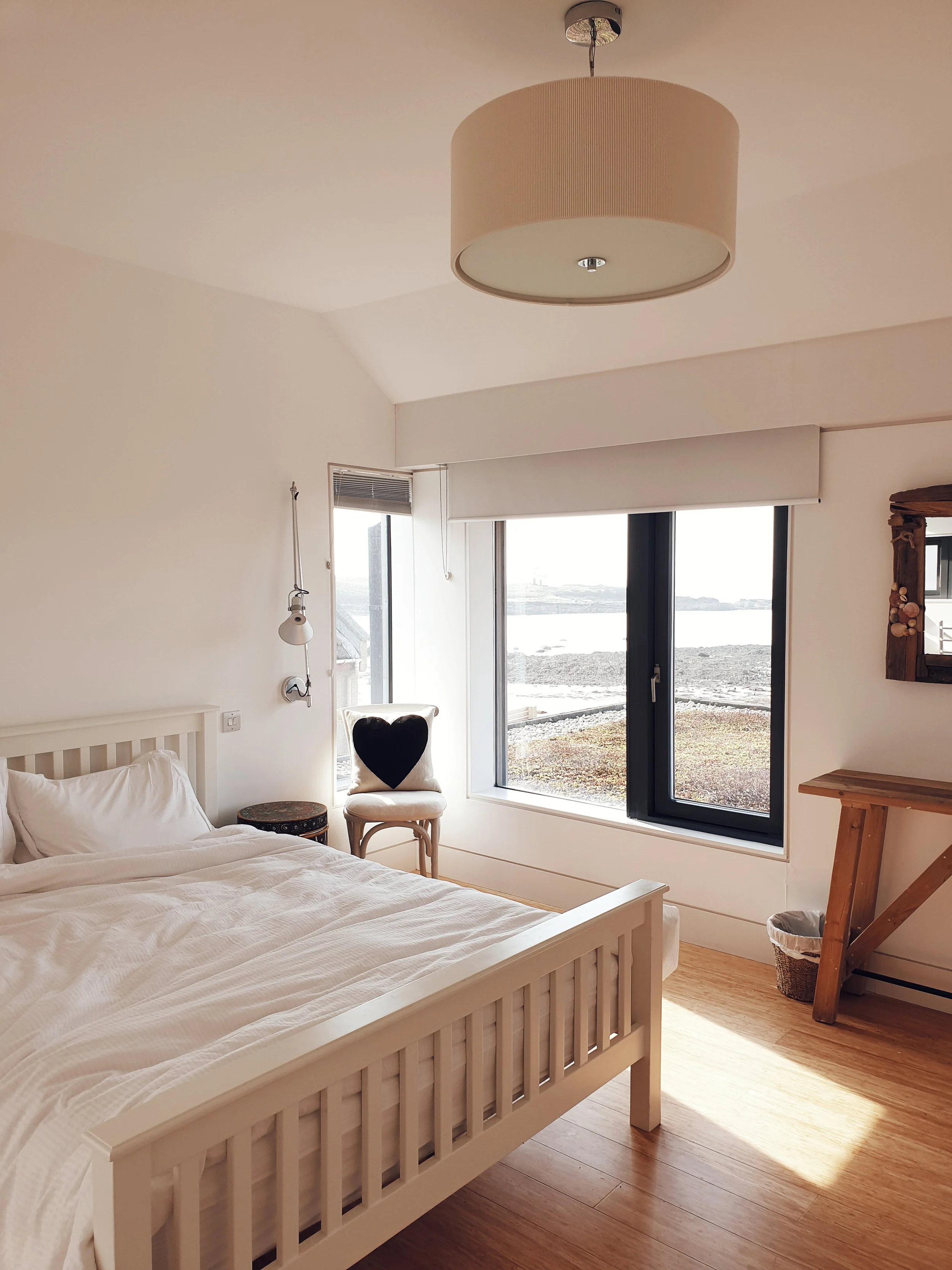 One of the bedrooms with views of a lighthouse