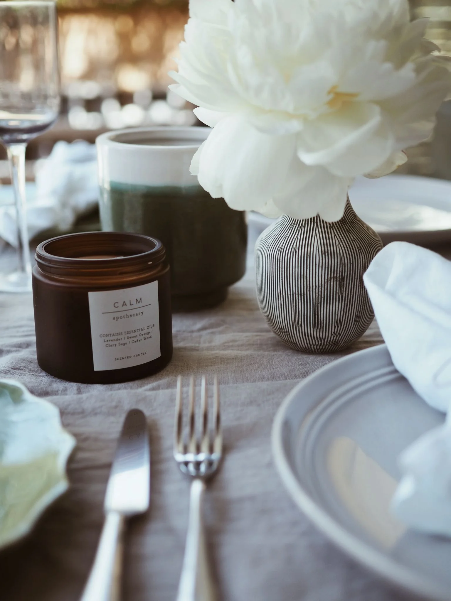 The candle from the calm range which is crafted with sweet orange and lavender essential oils