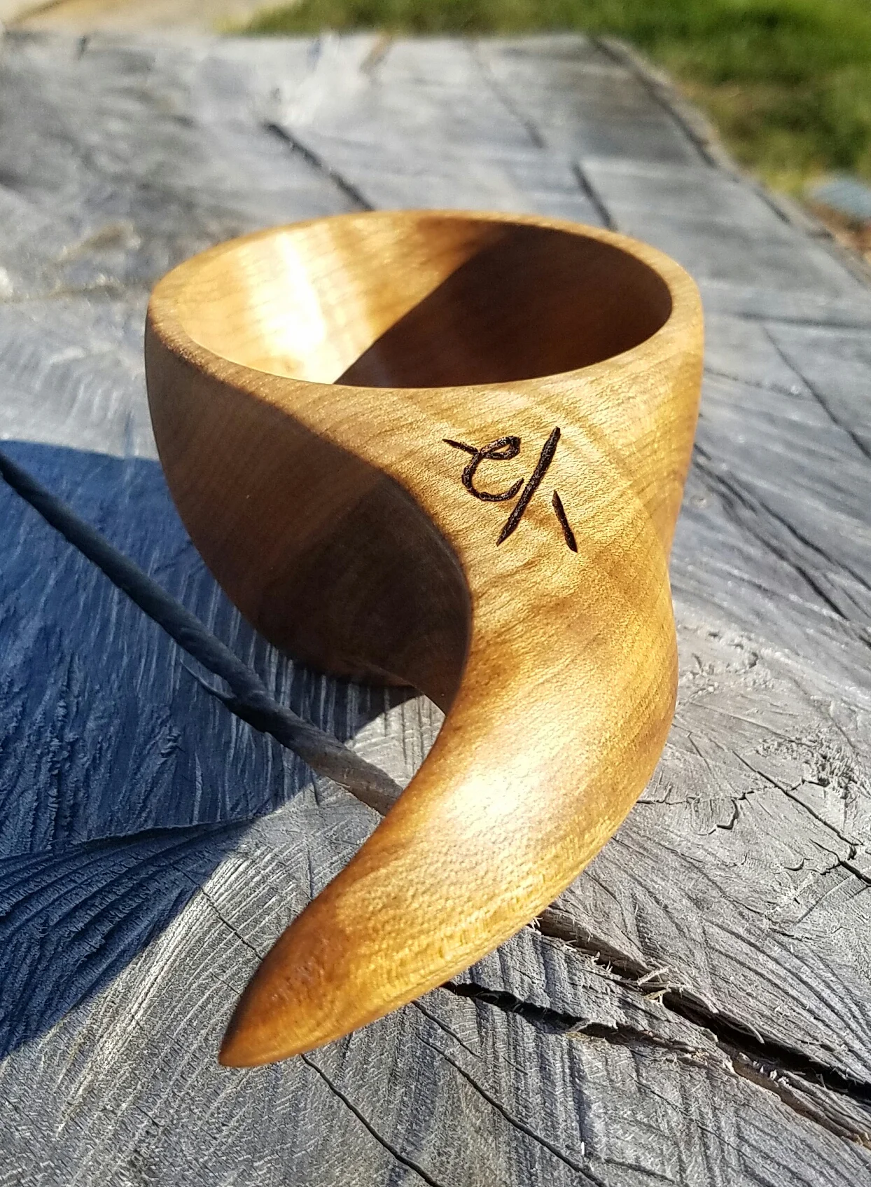 Close Up of Curved Handle Measuring Cup