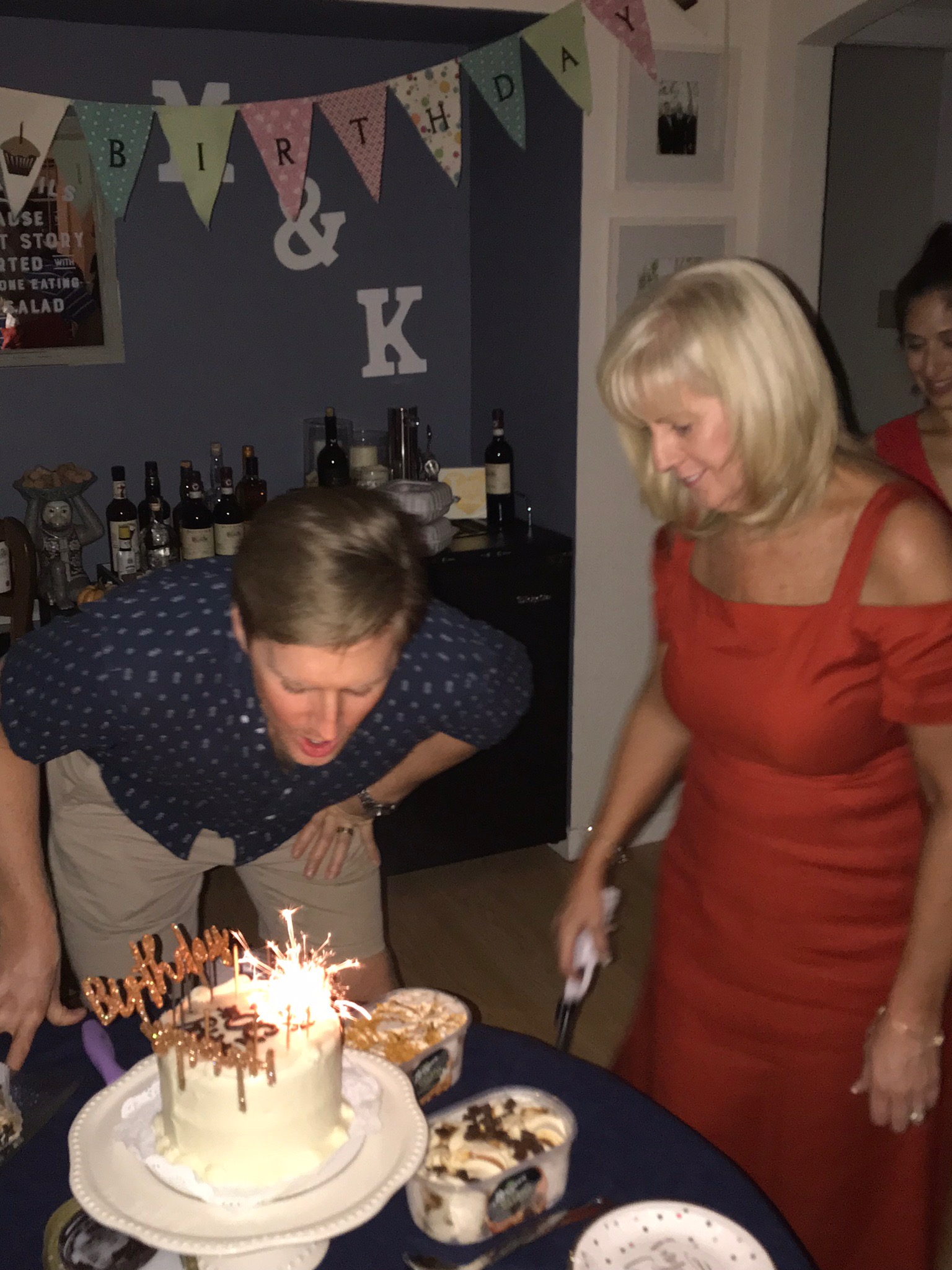 Kyle blowing out candle & Kim.jpg*.jpg