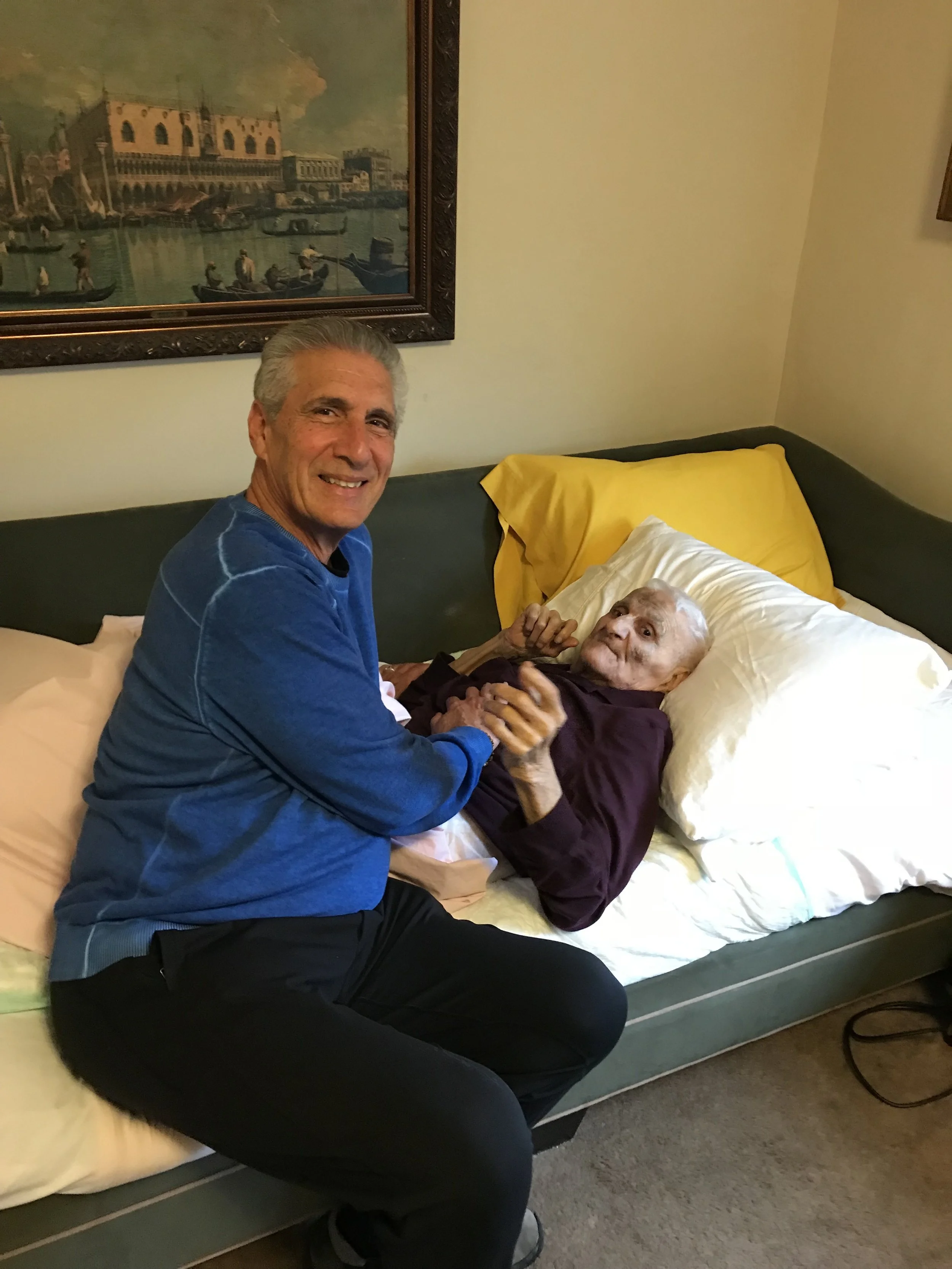With Dad at Bedside.jpg