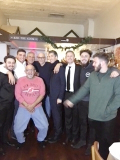 Family w Mike doing a russian dance.JPG