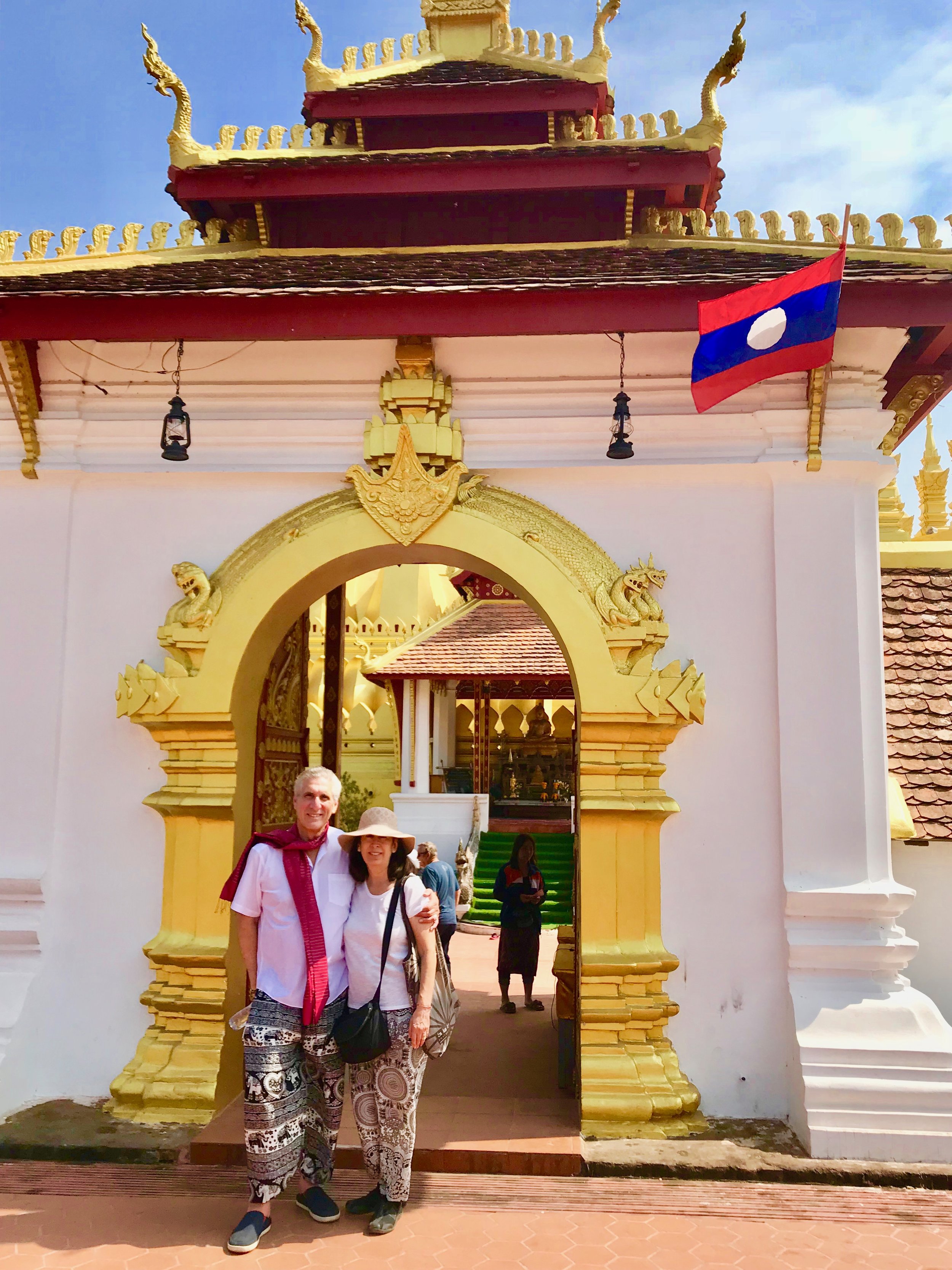 Den and Ceil front of Wat That Luang.jpg*.jpg