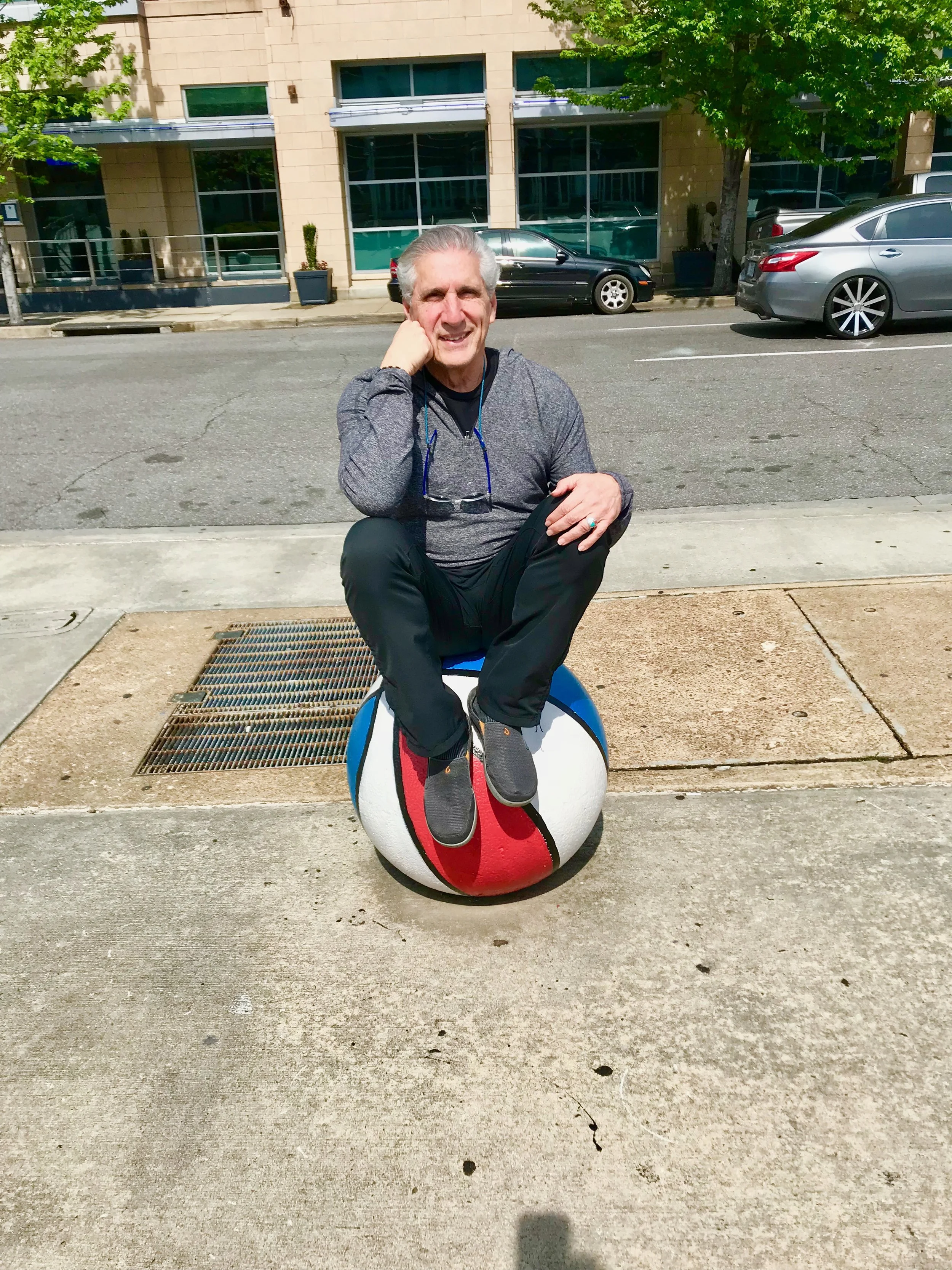 Sitting on basketball The Thinker.jpg