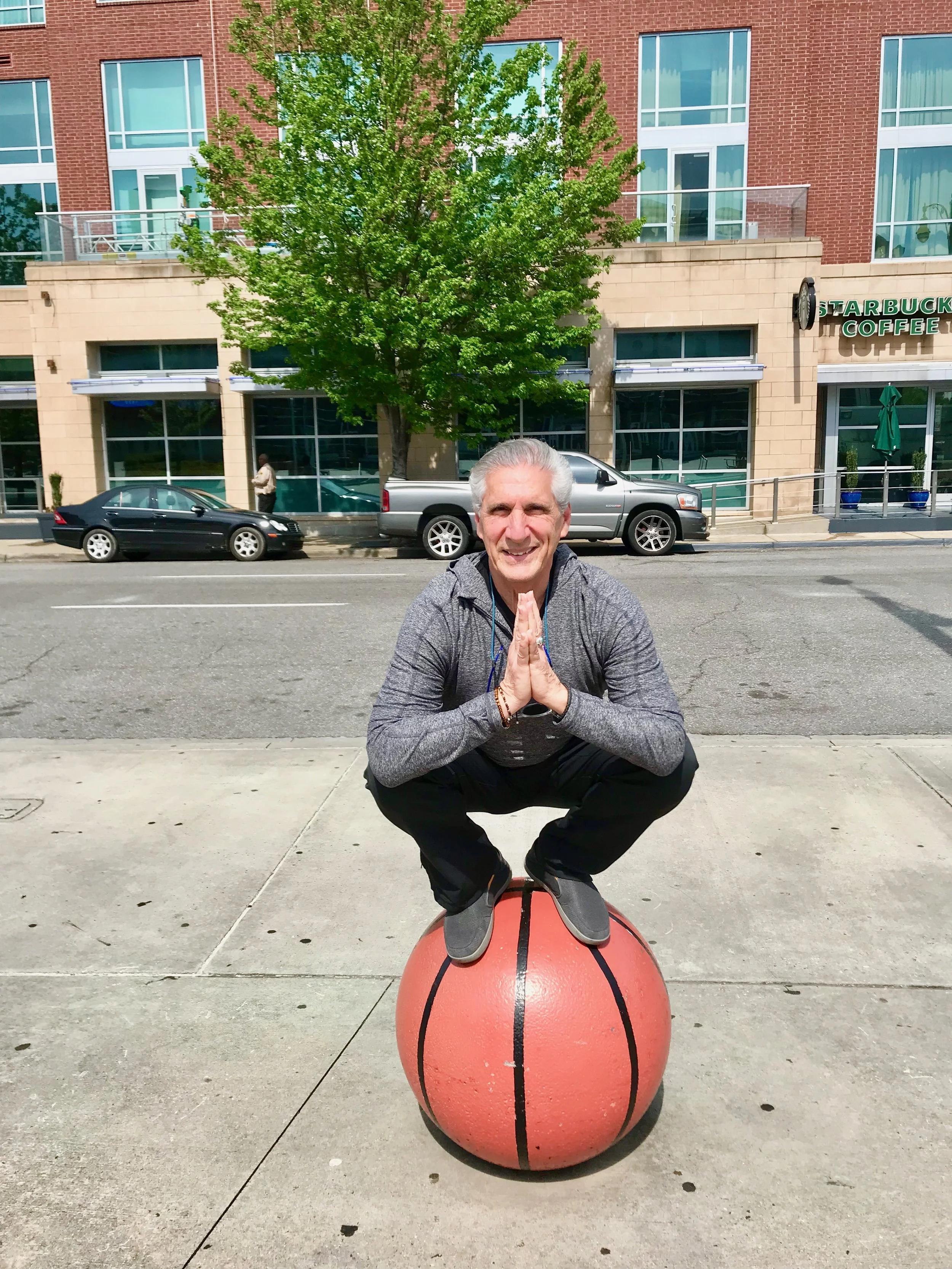 Squat Pose in Namaste on Basketball.jpg