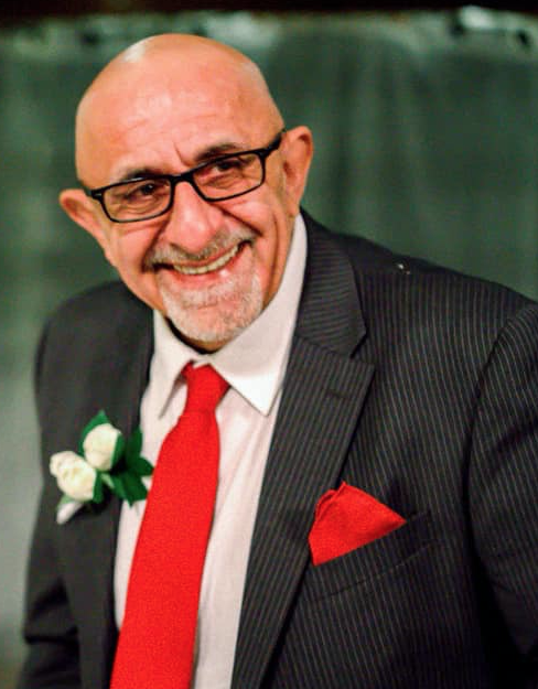 Mike in suit at Brock & Alix's Wedding*.png