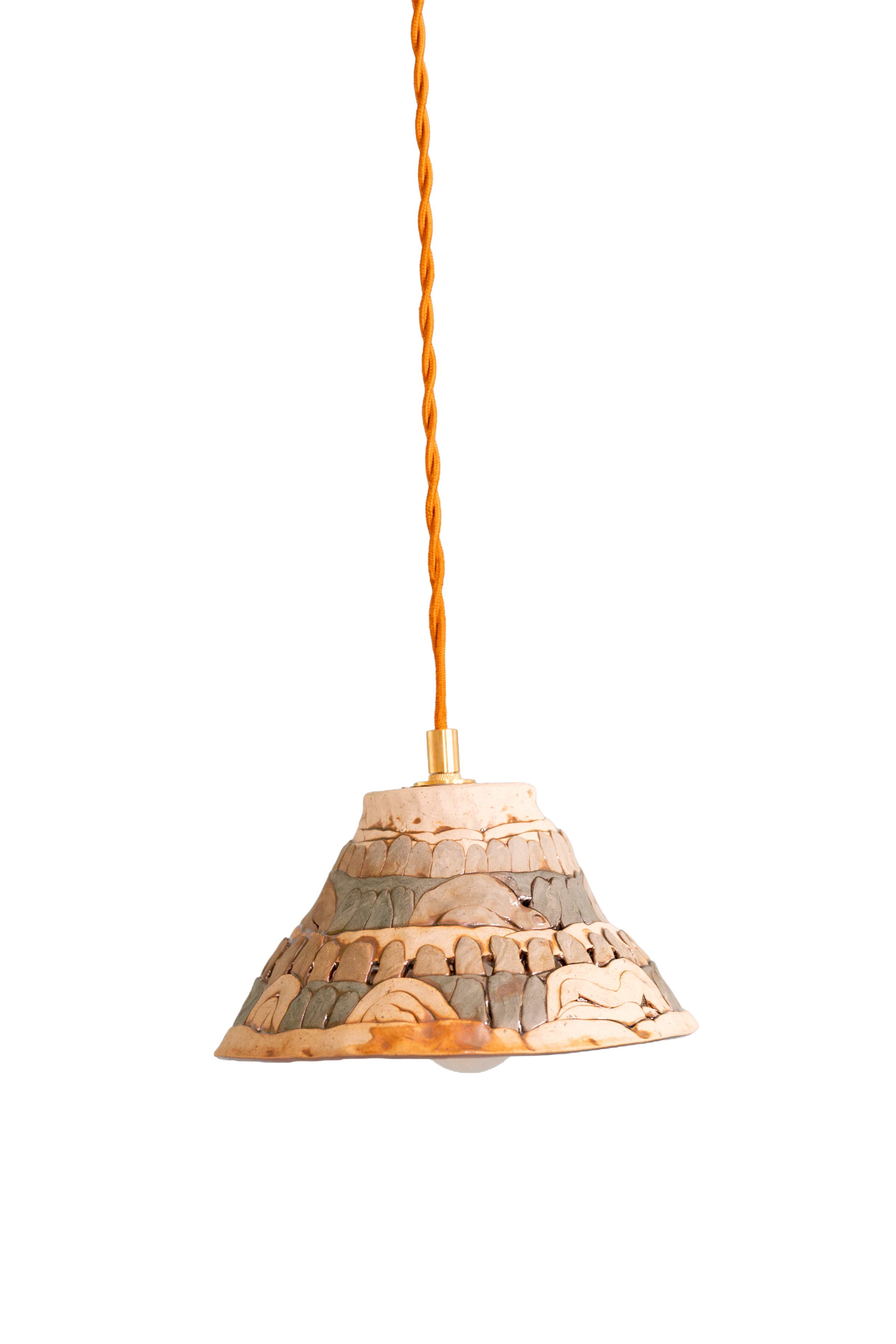 Close-up of a ceramic pendant light with a layered, scalloped design, hanging from an orange twisted cord.