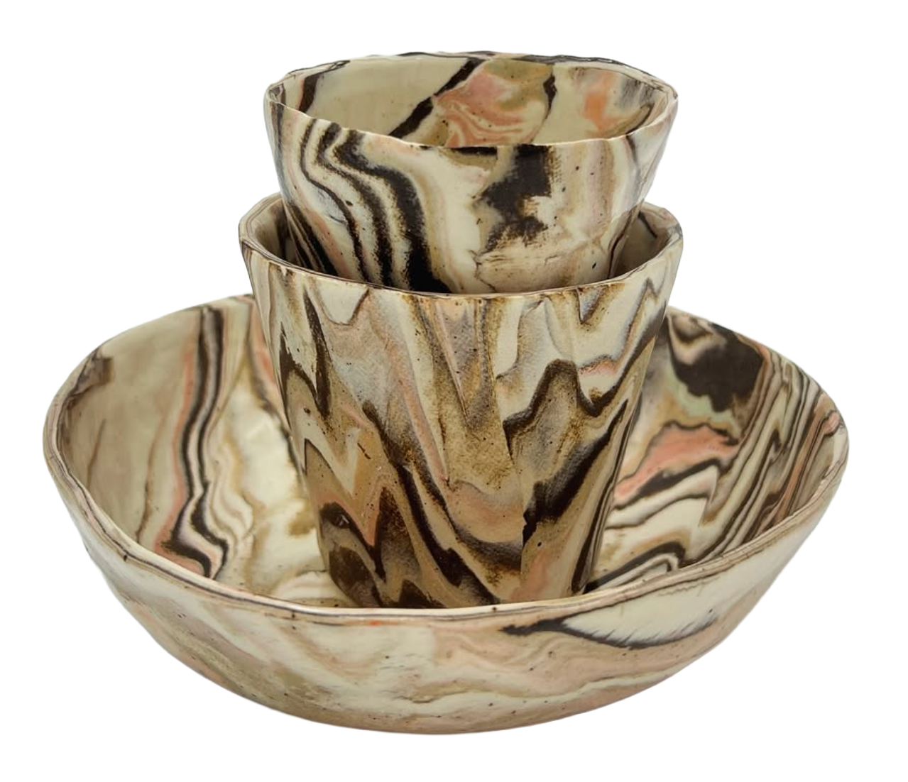 Set of three marble-patterned bowls of varying sizes stacked inside each other against a black background.