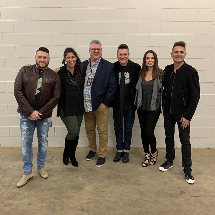 AVALON poses with Don Koch (General Manager, Red Street Records) and Jay DeMarcus (Owner/CEO, Red Street Records) backstage during at stop in Tupelo, MS at the BancorpSouth Arena during the Greatest Hits Live Tour. Courtesy Conduit Media / Red Street Records