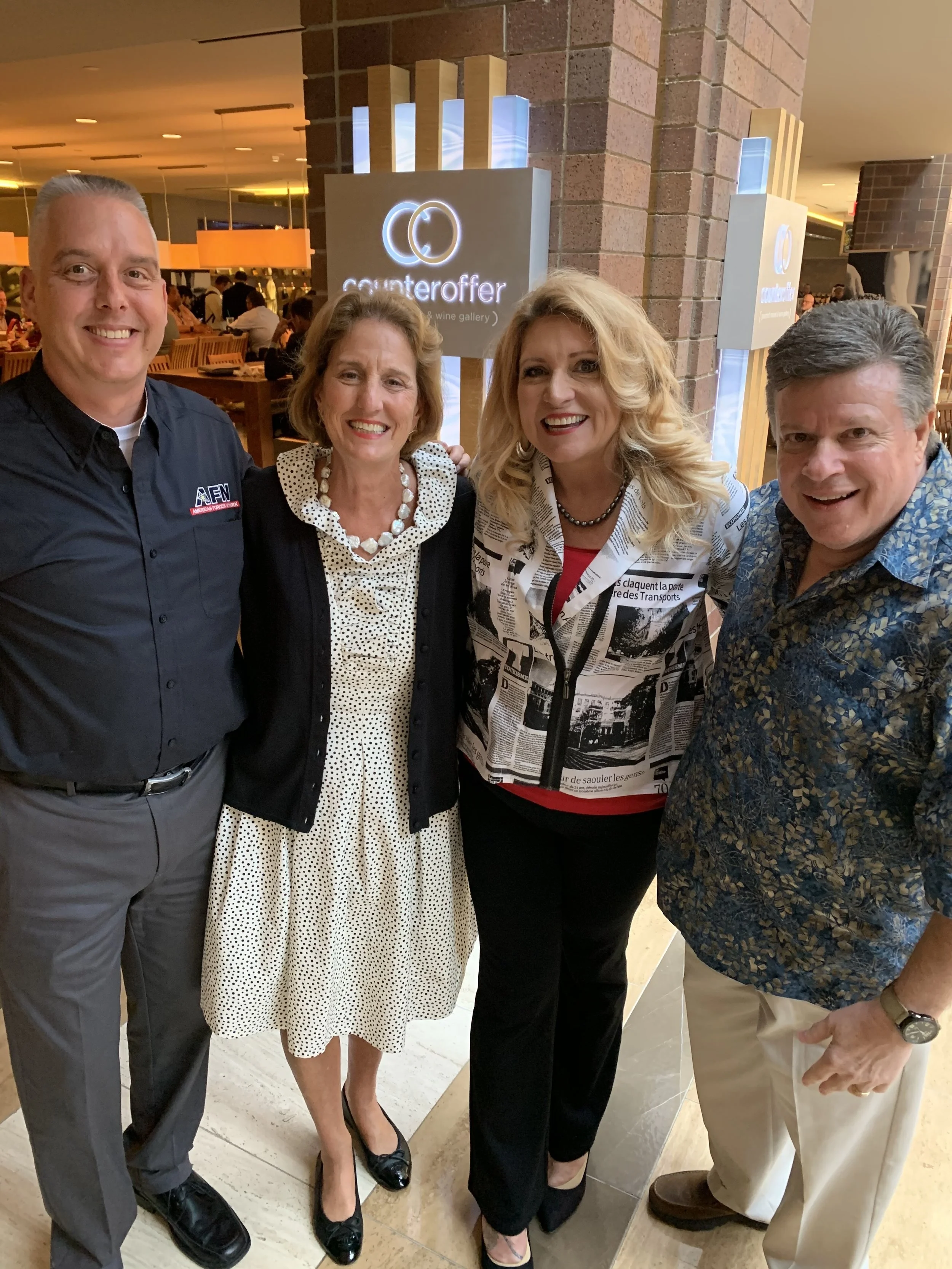 From L-R: Tom Arnholt (AFN Programming), Premiere Networks President Julie Talbott, Delilah and Curt Eckstein (AFN Operations) at the 2019 NAB Radio Show at Hilton Anatole Hotel in Dallas, Texas.