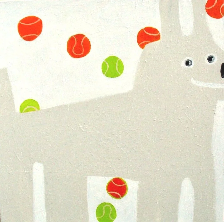 tennis balls and puppy