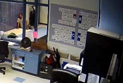  This is a screenshot of surveillance video footage taken from inside Erie County’s work-release center. This image, from the top right side of the footage, shows inmate Felix L. Manus after he lowered himself onto the floor at the center on May 30. 