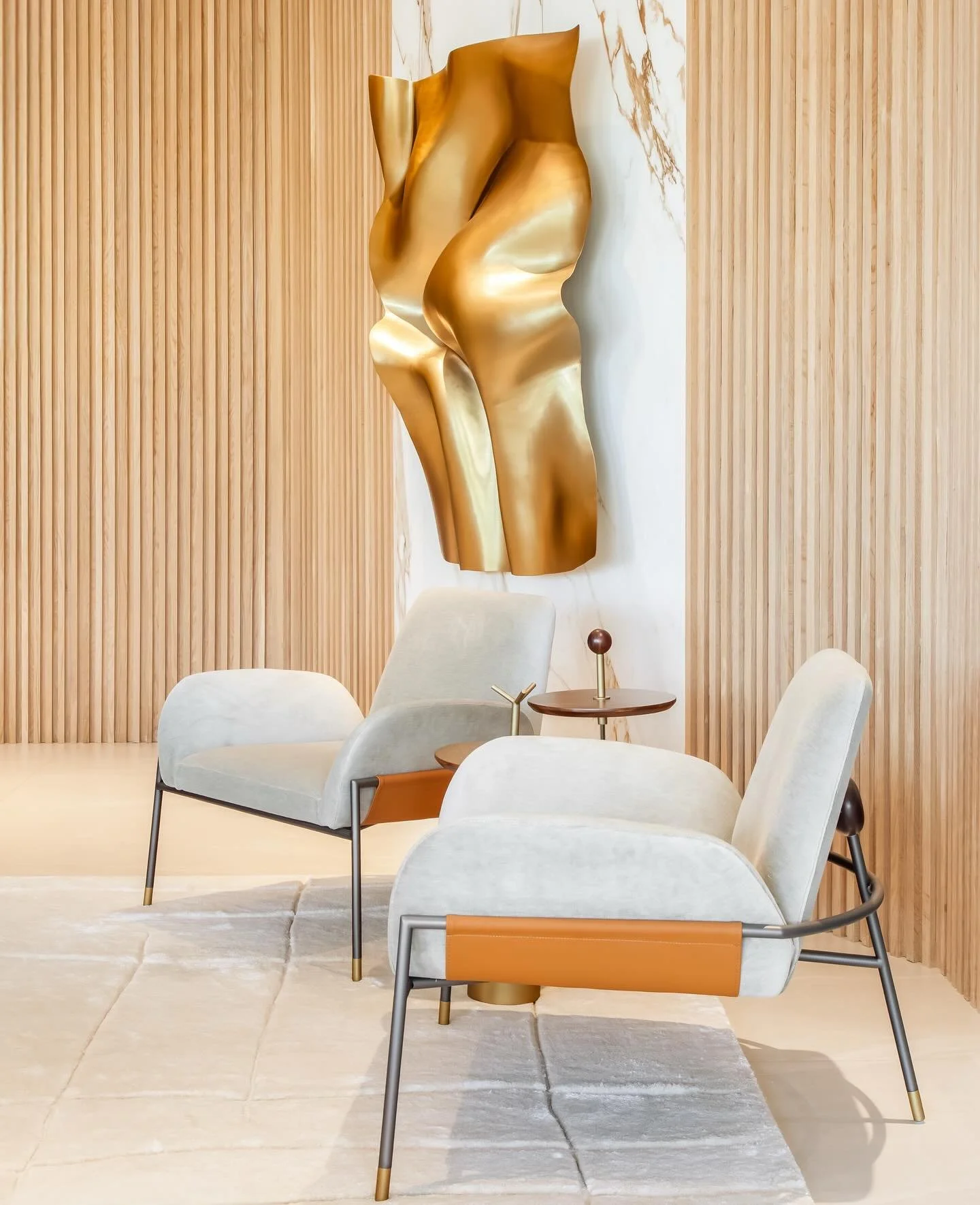 Many elements yet one cohesive story. 
Metal, leather, warm wood, natural stone and soft textiles come together to make this intimate conversation space feel layered, yet intentional.

#luxury #interior #design #miami #interiors