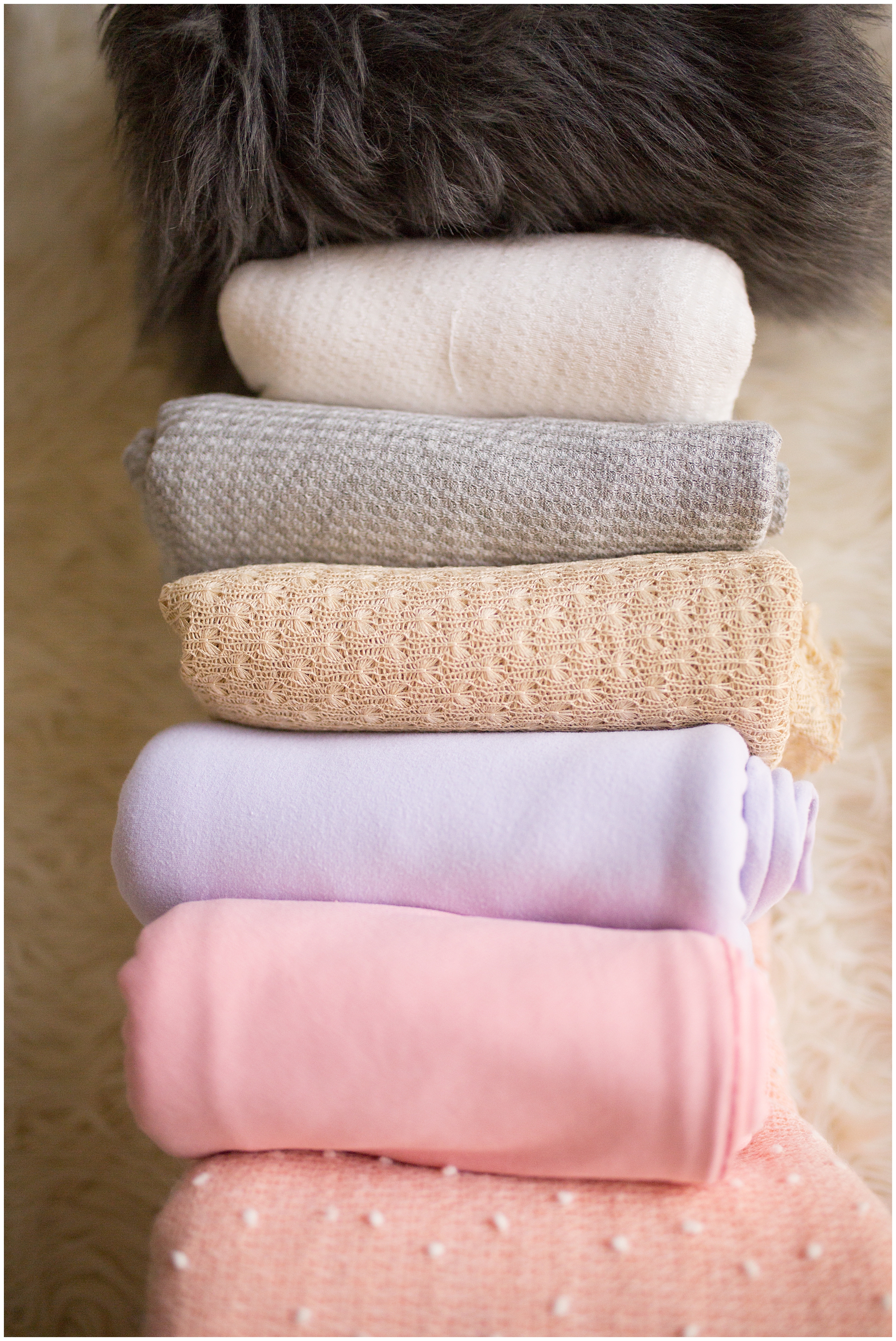 Posing blankets that I use on my bean bag. Made of super soft cotton. The next image will show you where I place them!