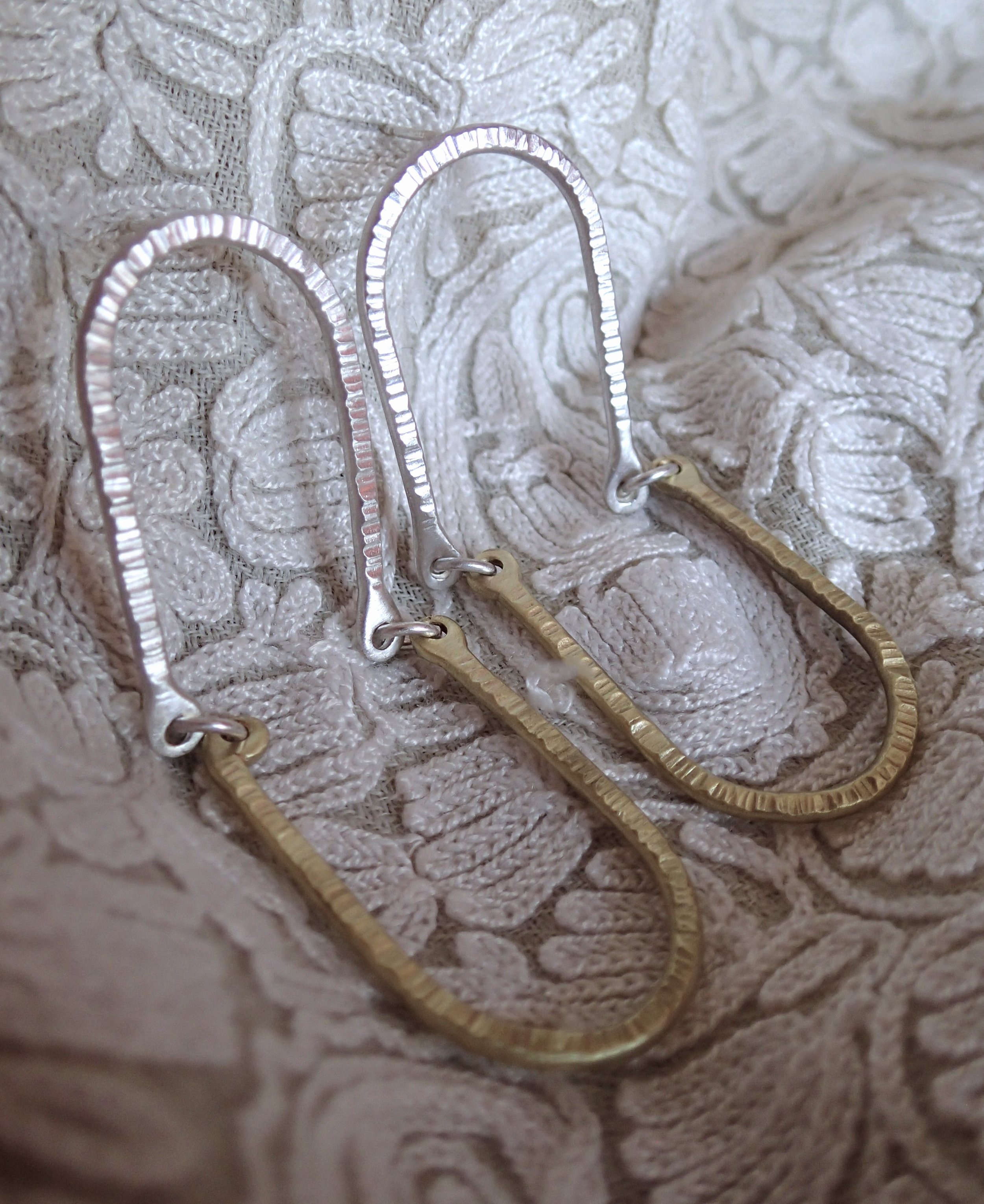 Silver and Brass swingers sitting.JPG