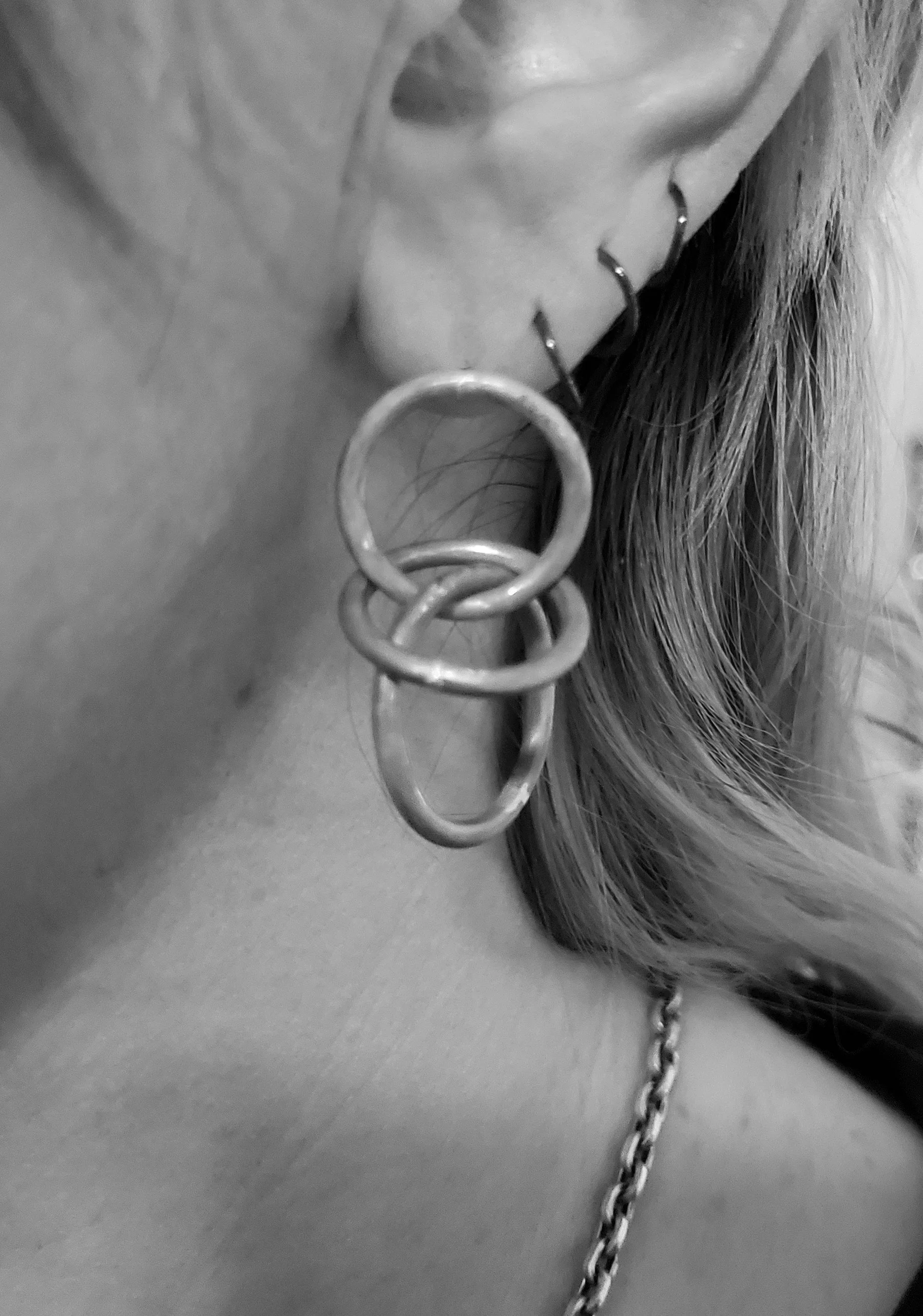 Orbit earrings brass sm WORN.jpg