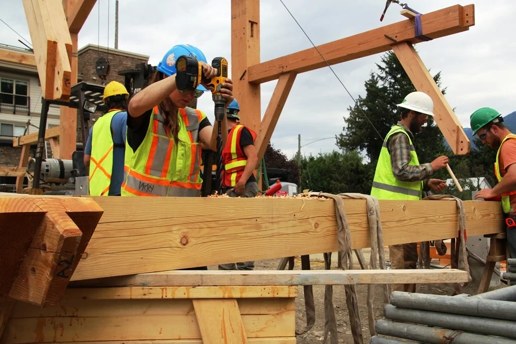 The Guild, hard at work raising a massive 50 x 150-ft. open-air barn pavilion for community events in Pemberton, B.C. Photo courtesy Bruce Lindsay