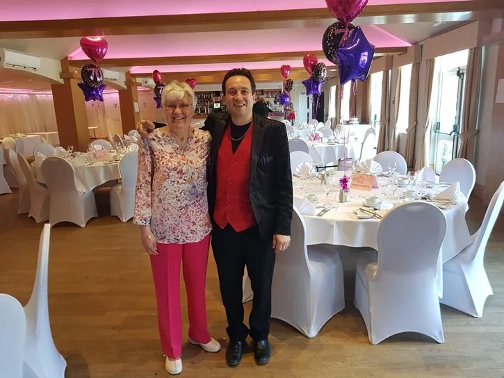 Matthew Garrett magician performing at Slepe Hall in Cambridgeshire