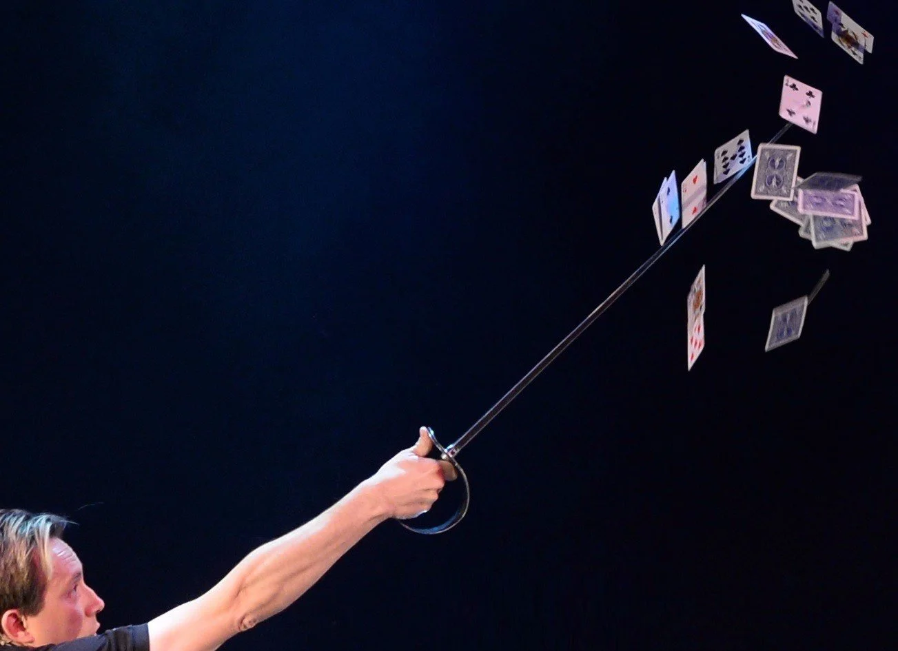Matthew Garrett performing his card sword routine at the Keeping It Live cabaret showcase in Northampton