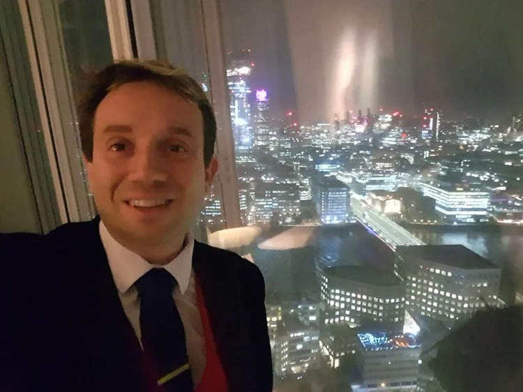 Matthew Garrett performing as a corporate magician at The Shard London