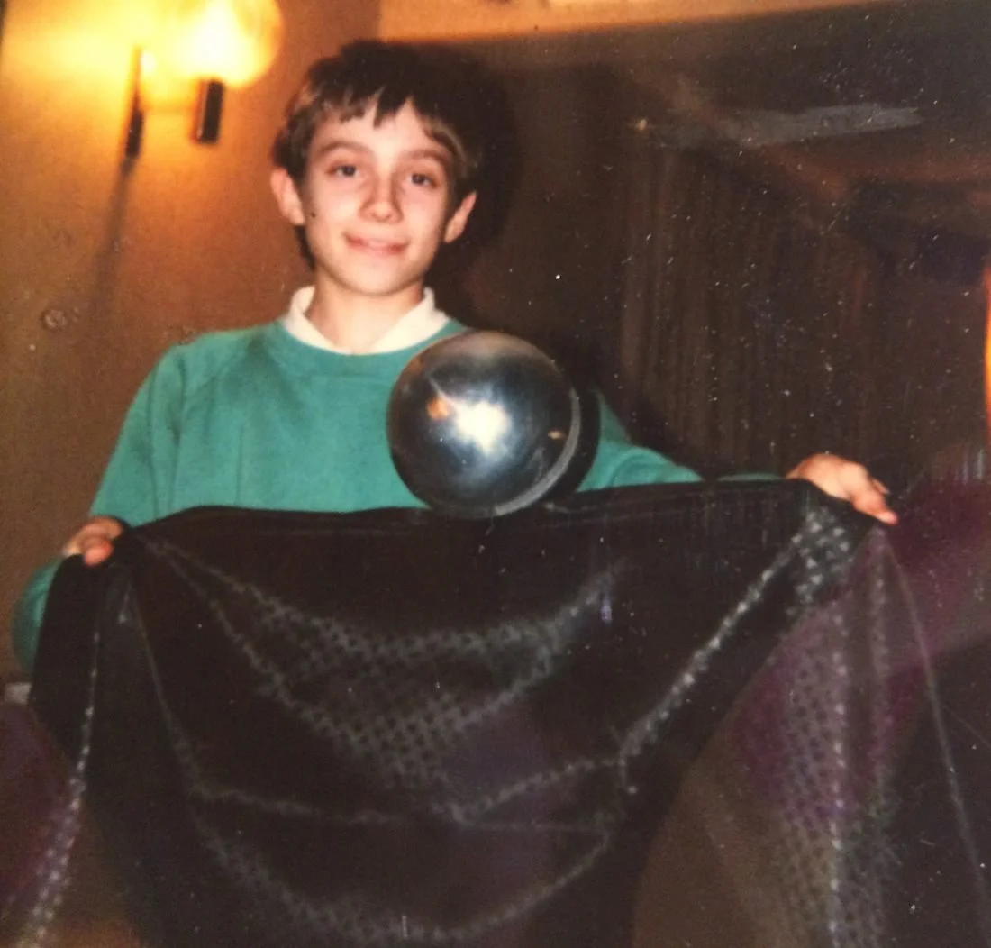 Matthew Garrett performing magic at age 11 during his early years as an aspiring magician.