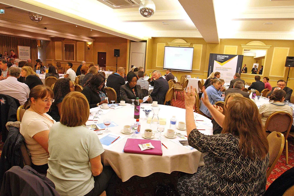 Matthew Garrett performing close-up magic for guests at Holiday Inn Corby
