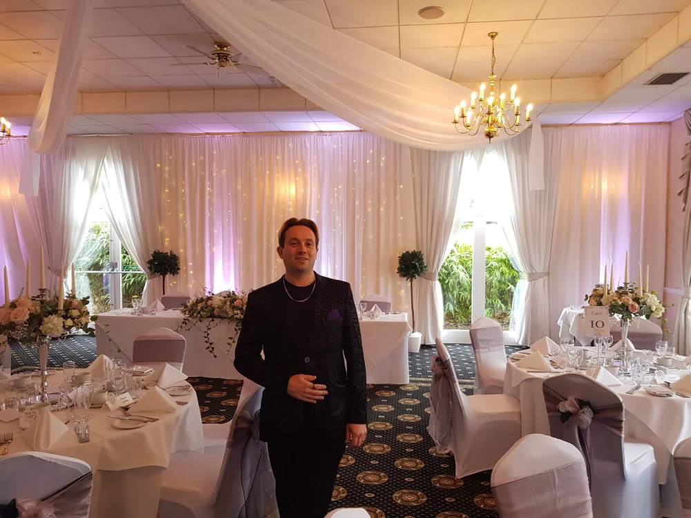 Matthew Garrett performing close-up magic at the Holiday Inn in Corby